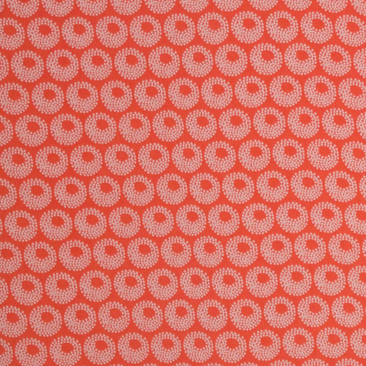 Soepele viscose met cirkels koraal/wit