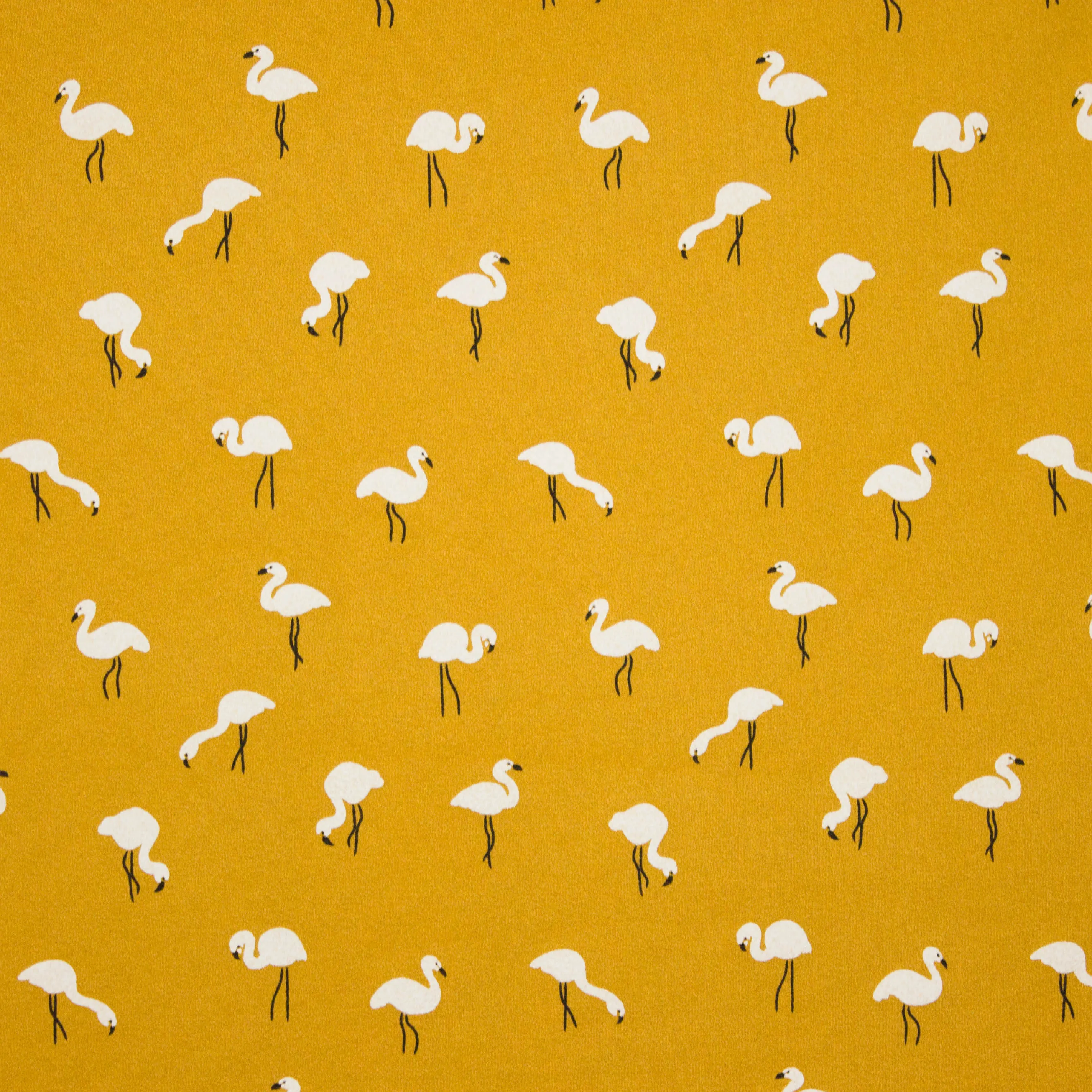 Crêpe tricot met flamingo motief op oker achtergrond