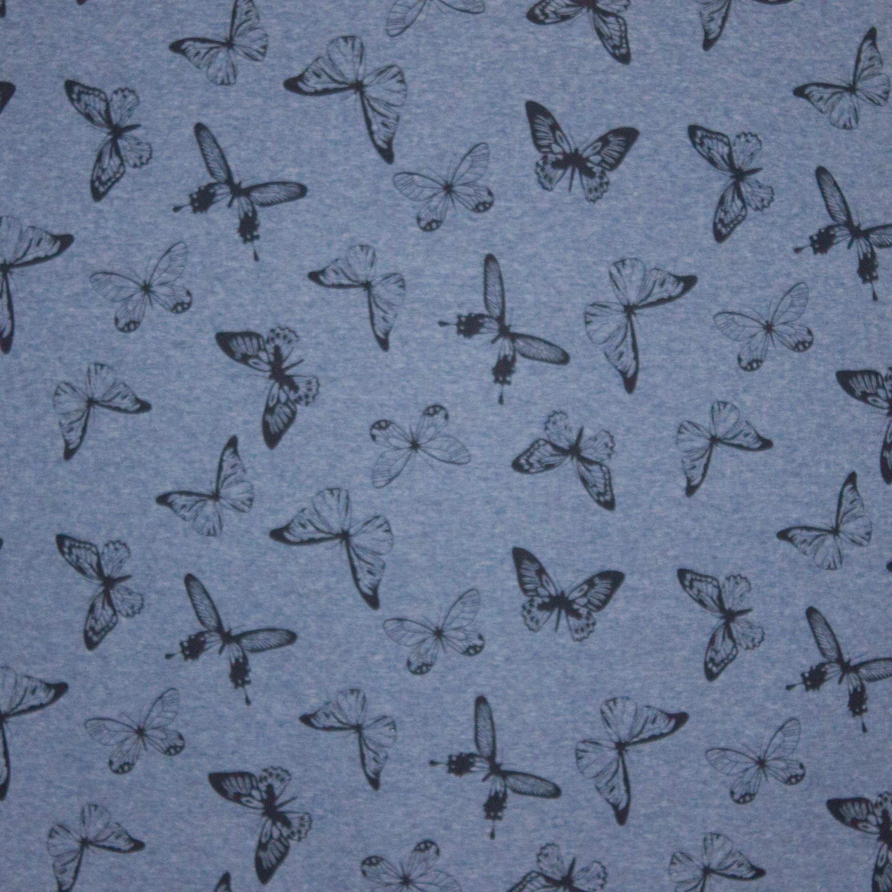 sweaterstof in jeansblauw met vlinders