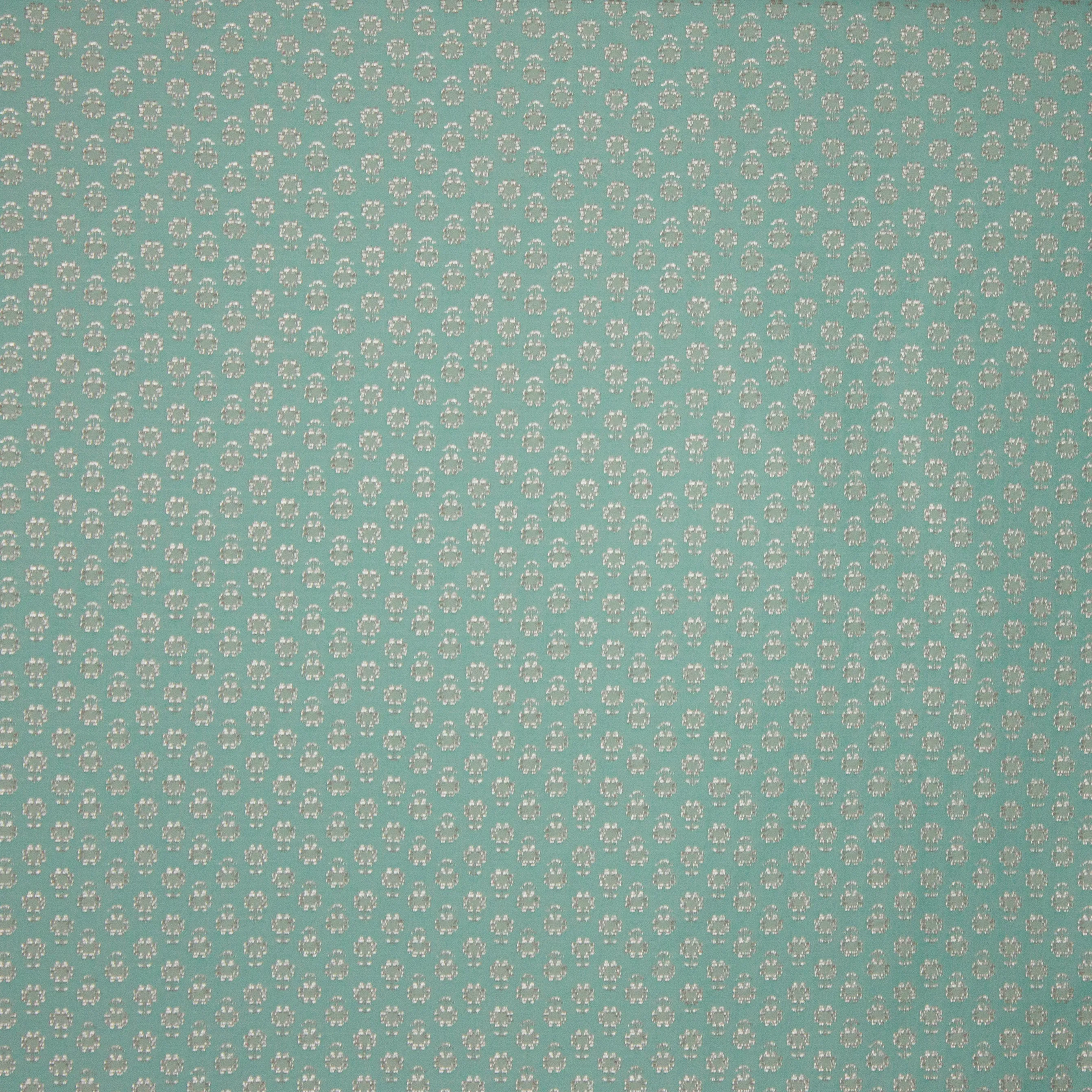 Jacquard muntgroen met zilveren bloem