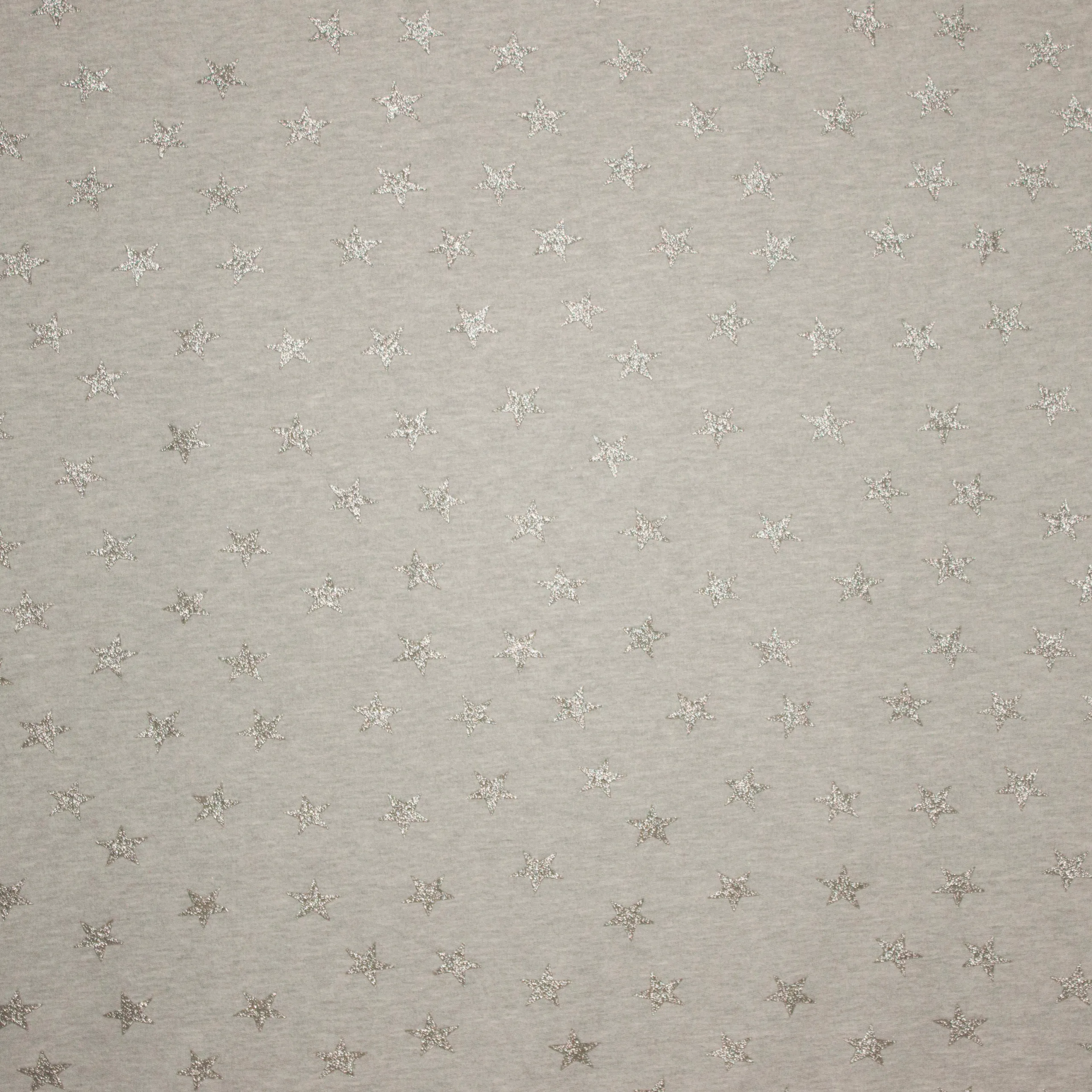 Sweaterstof lichtgrijs met sterren in zilveren glitter
