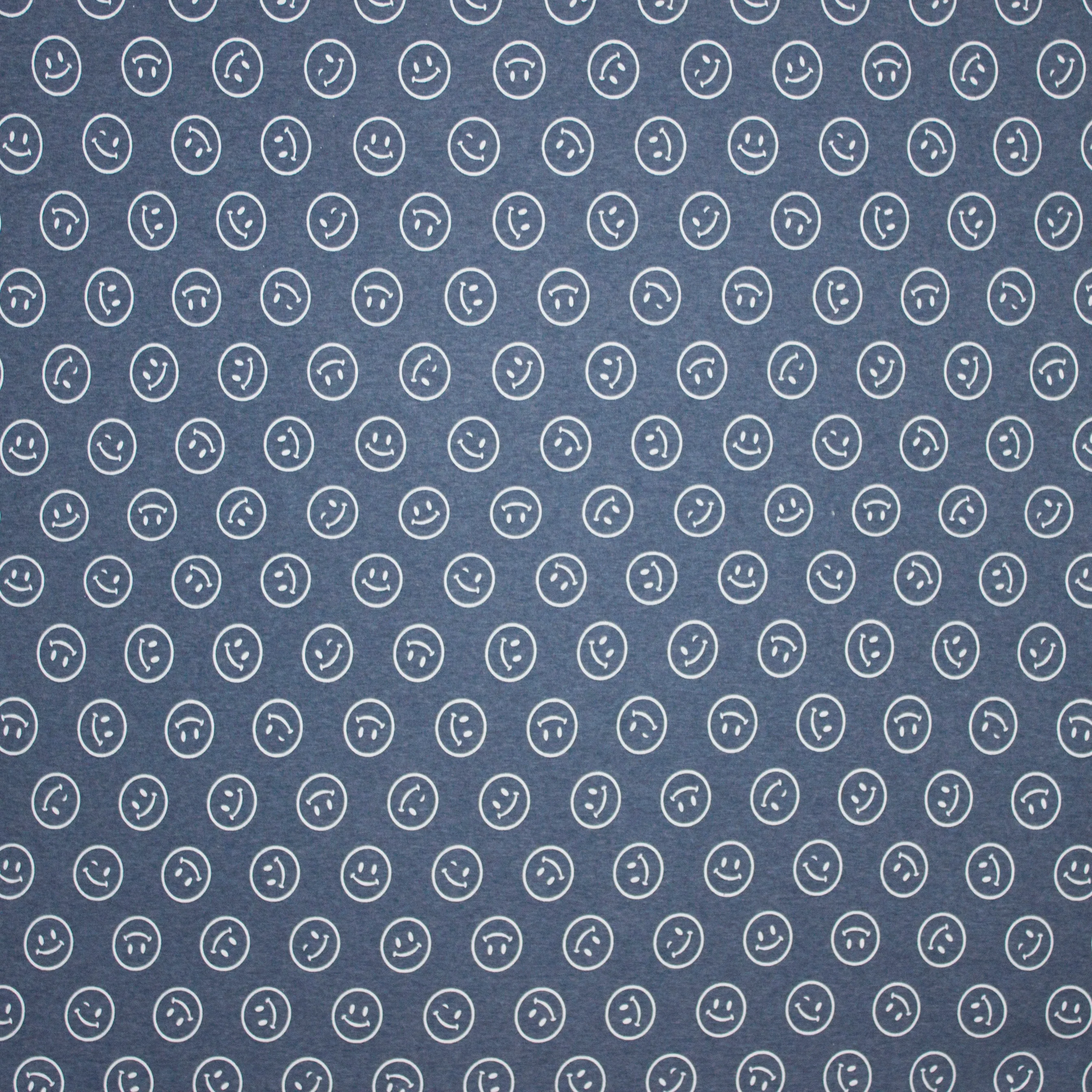 sweaterstof in jeansblauw met witte smileys