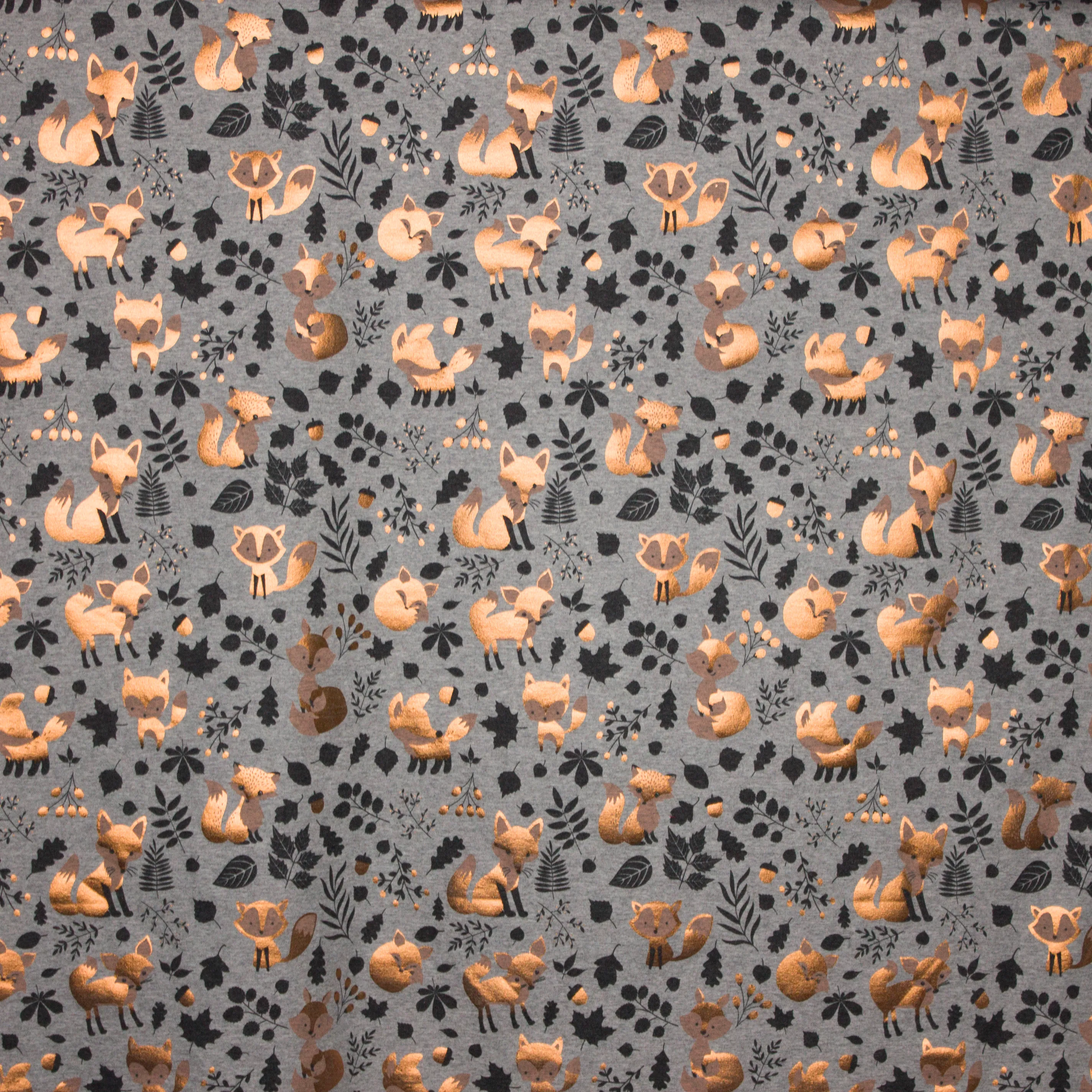 Grijze tricot met vosjes in glitter in koperkleur