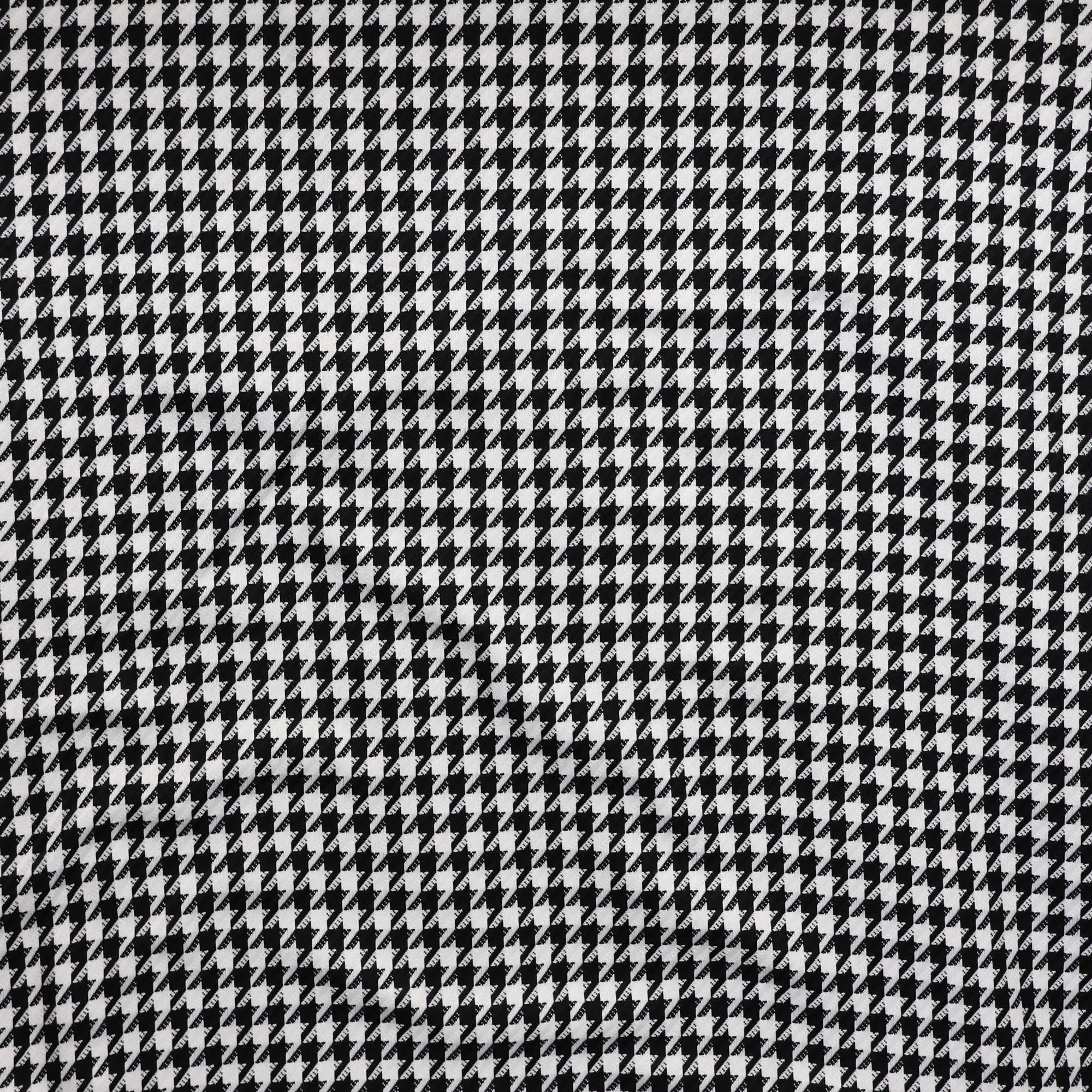 Polyester viscose met zwart en wit pied de poule patroon