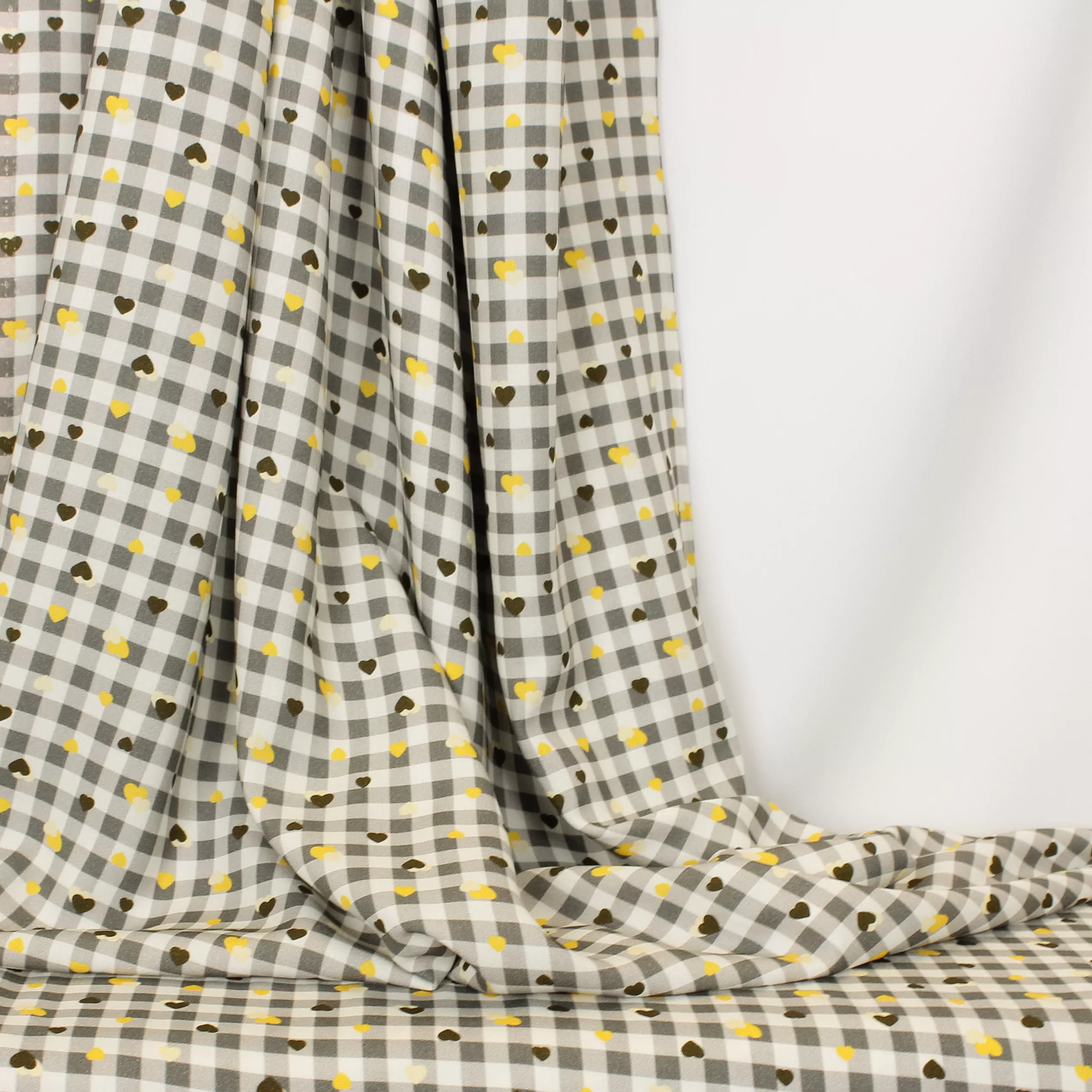 Geruite viscose met bruine en gele hartjes