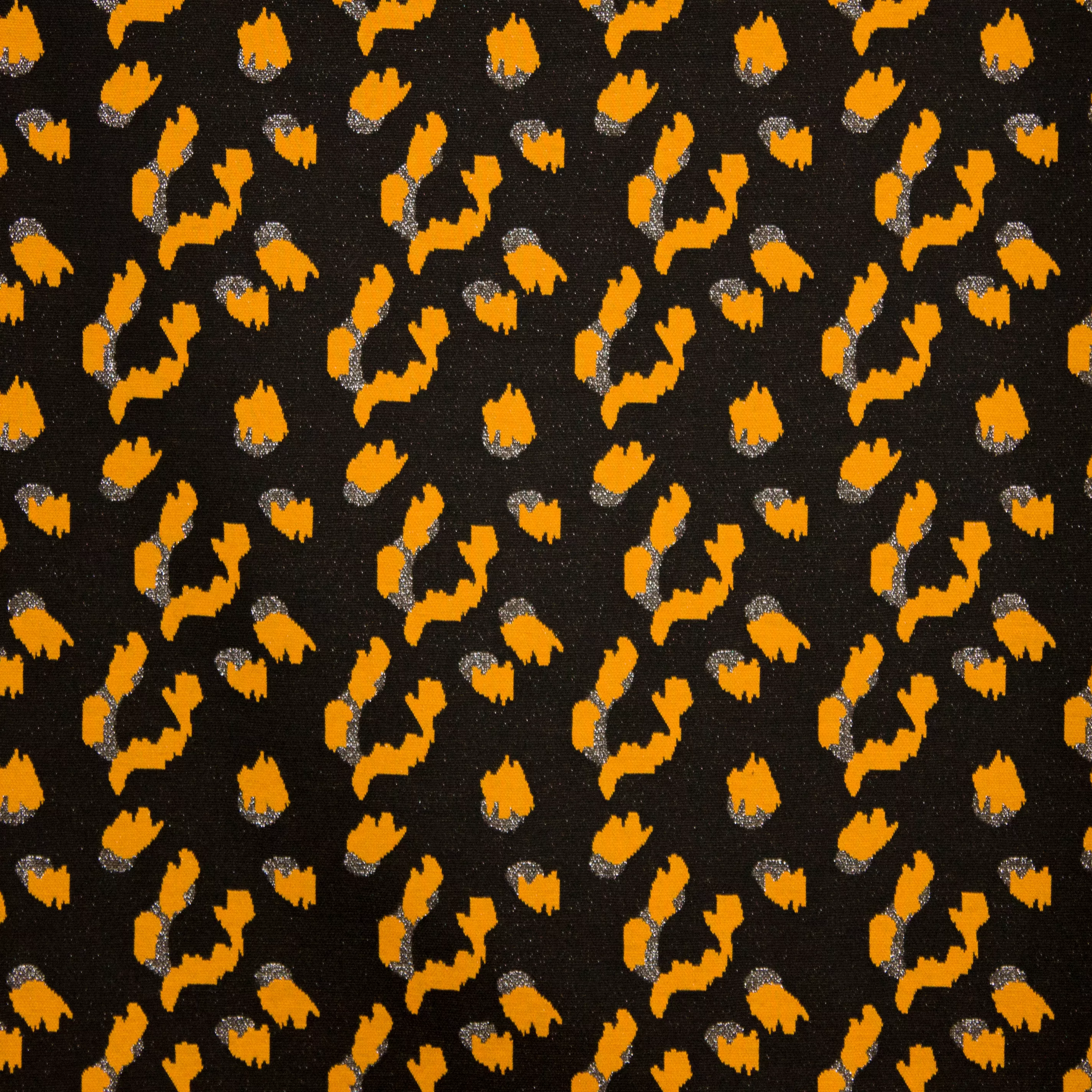 Metallic jersey zwart met oker luipaardprint