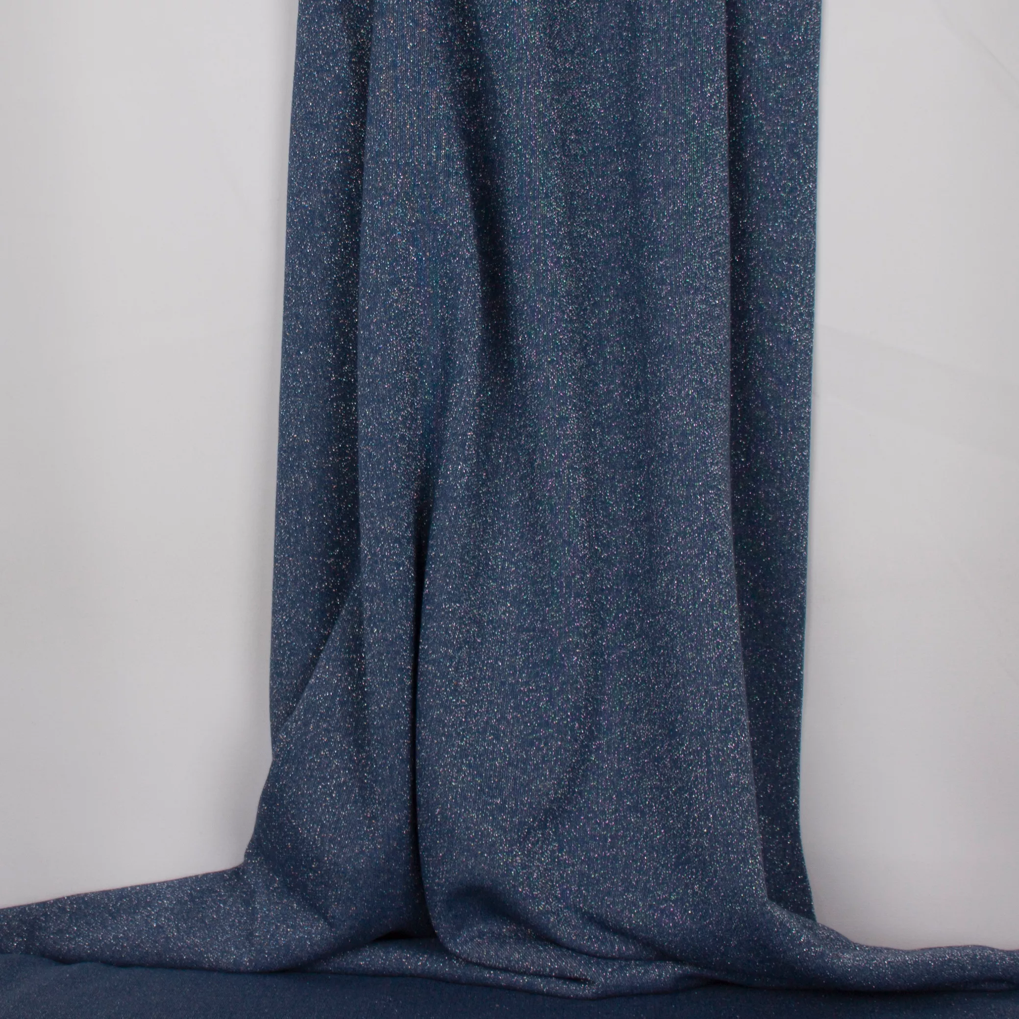 Blauwe sweaterstof met zilveren glitter