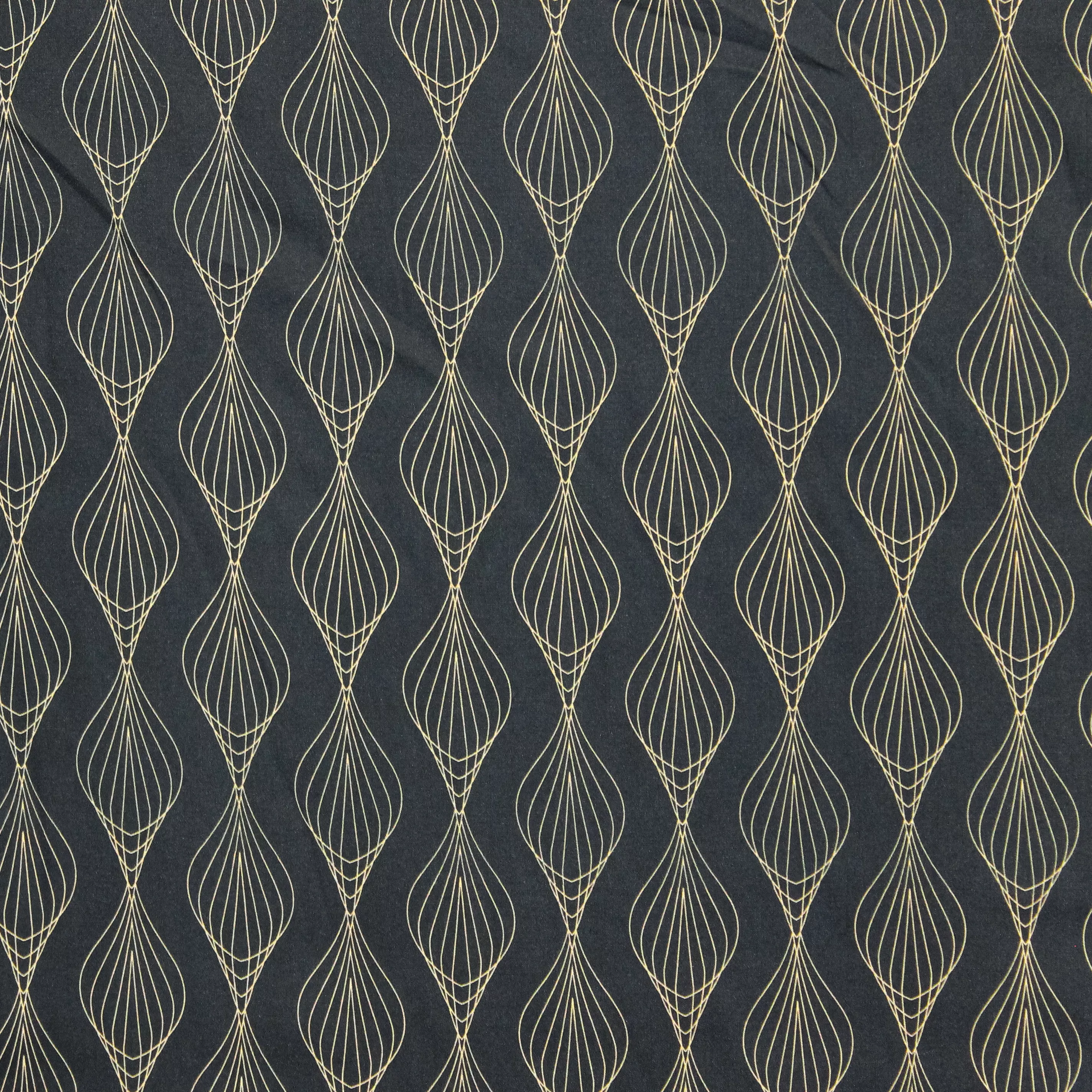 Polyester blauw met geometrisch motief - Knipmode