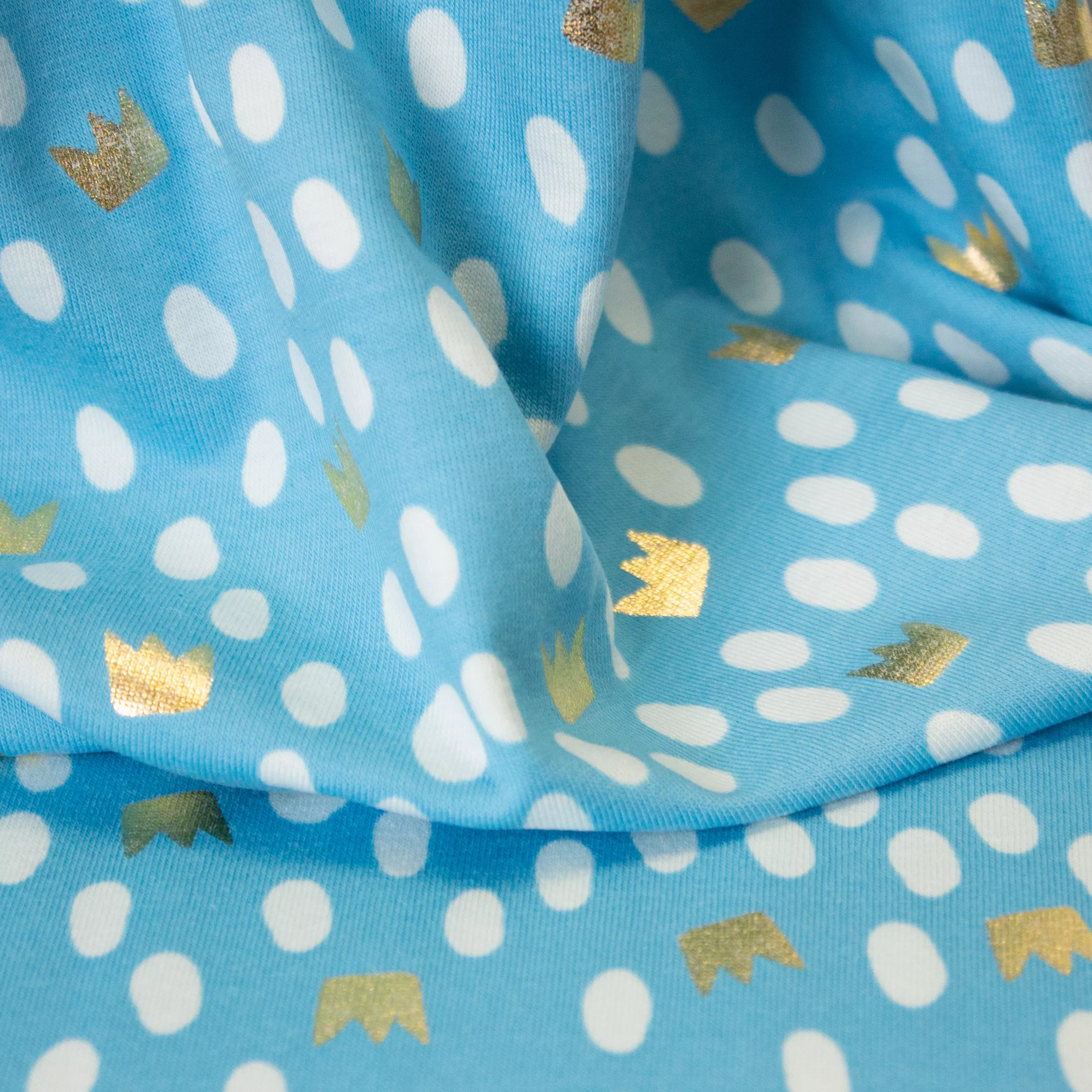 Blauwe tricot met gouden kroontjes en stippen