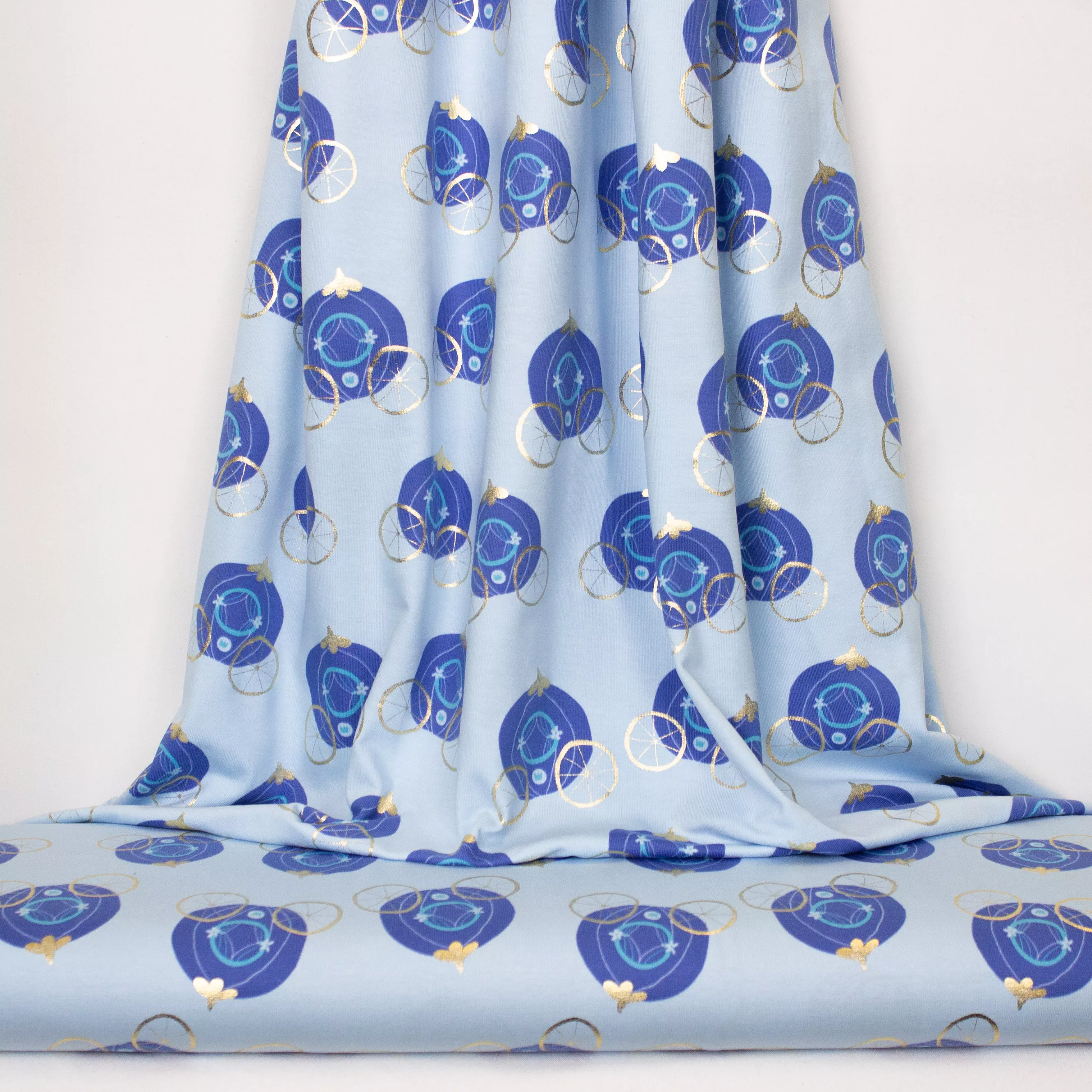 Blauwe tricot met pompoenkoetsen in blauw en goud