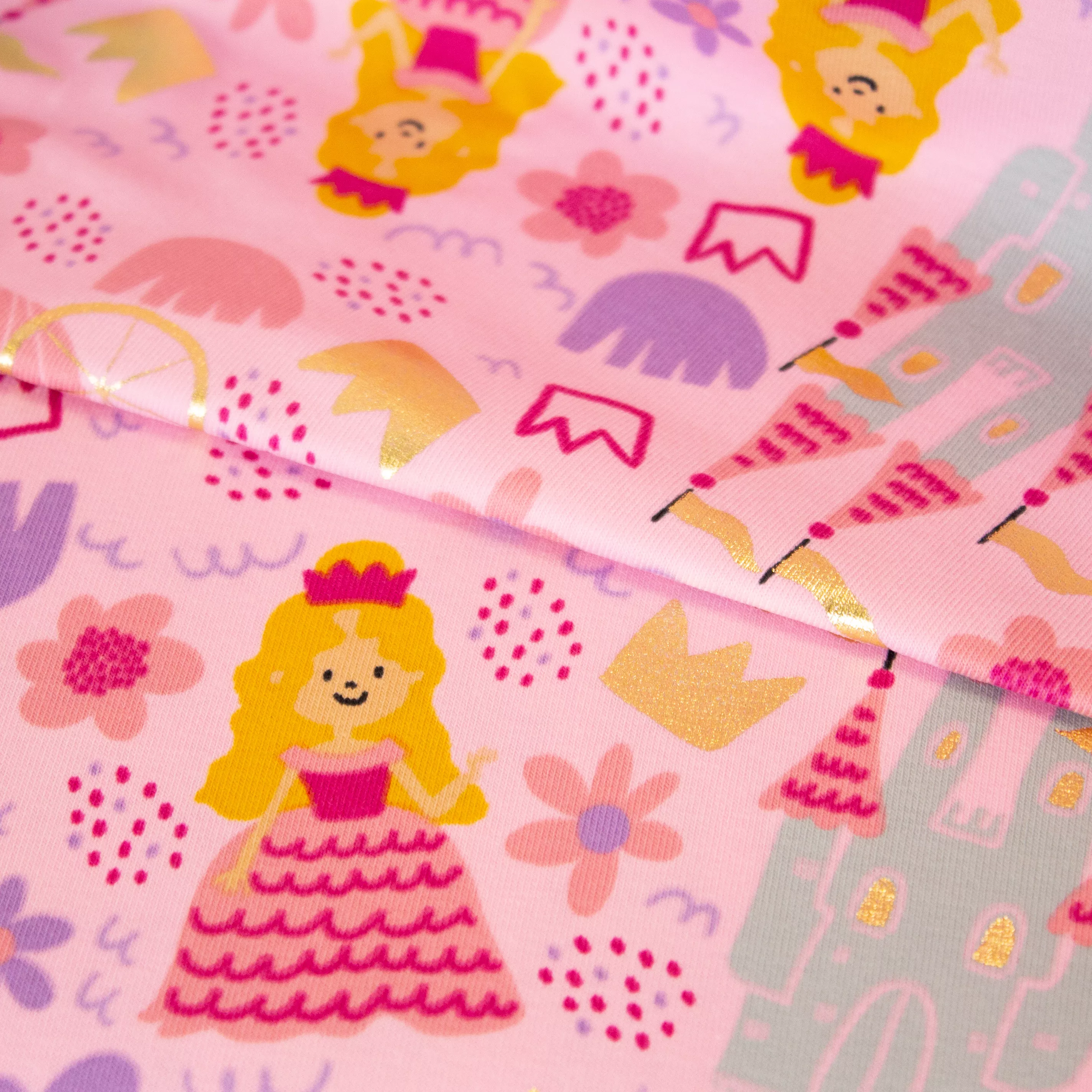 Roze tricot met prinsessen