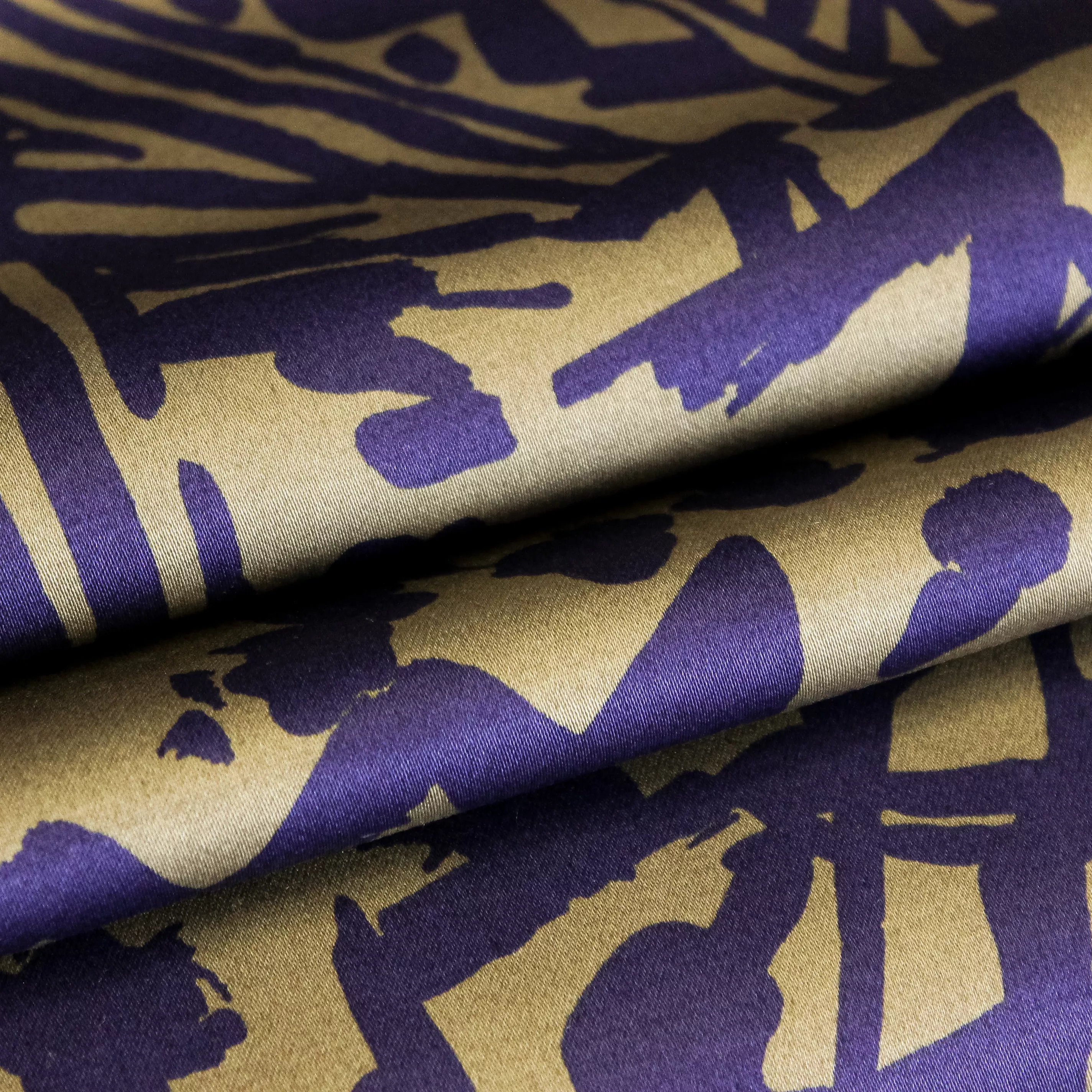 Rekbare katoen groen/blauw met motief