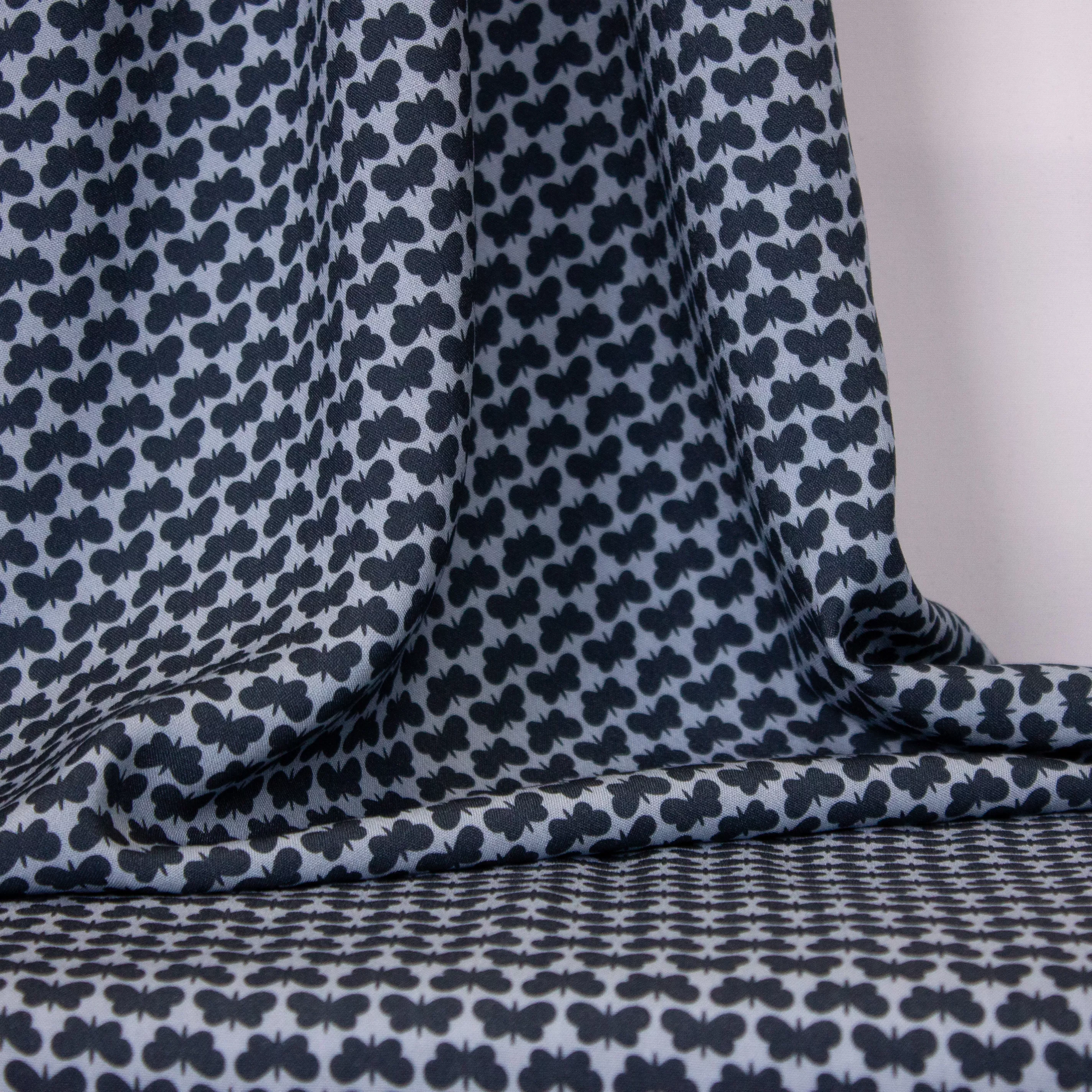 Viscose blauw met vlinders