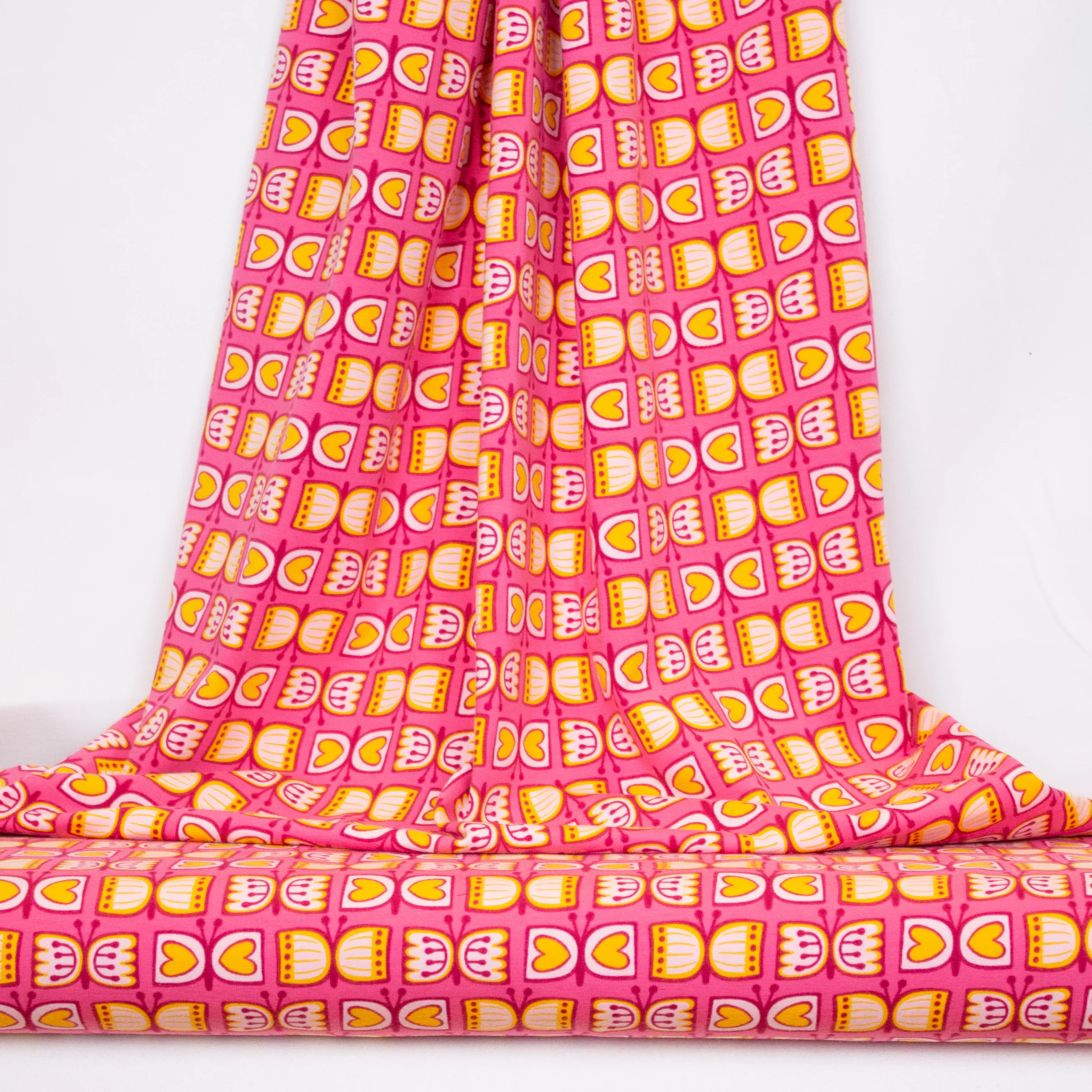 Katoentricot roze met vlinders