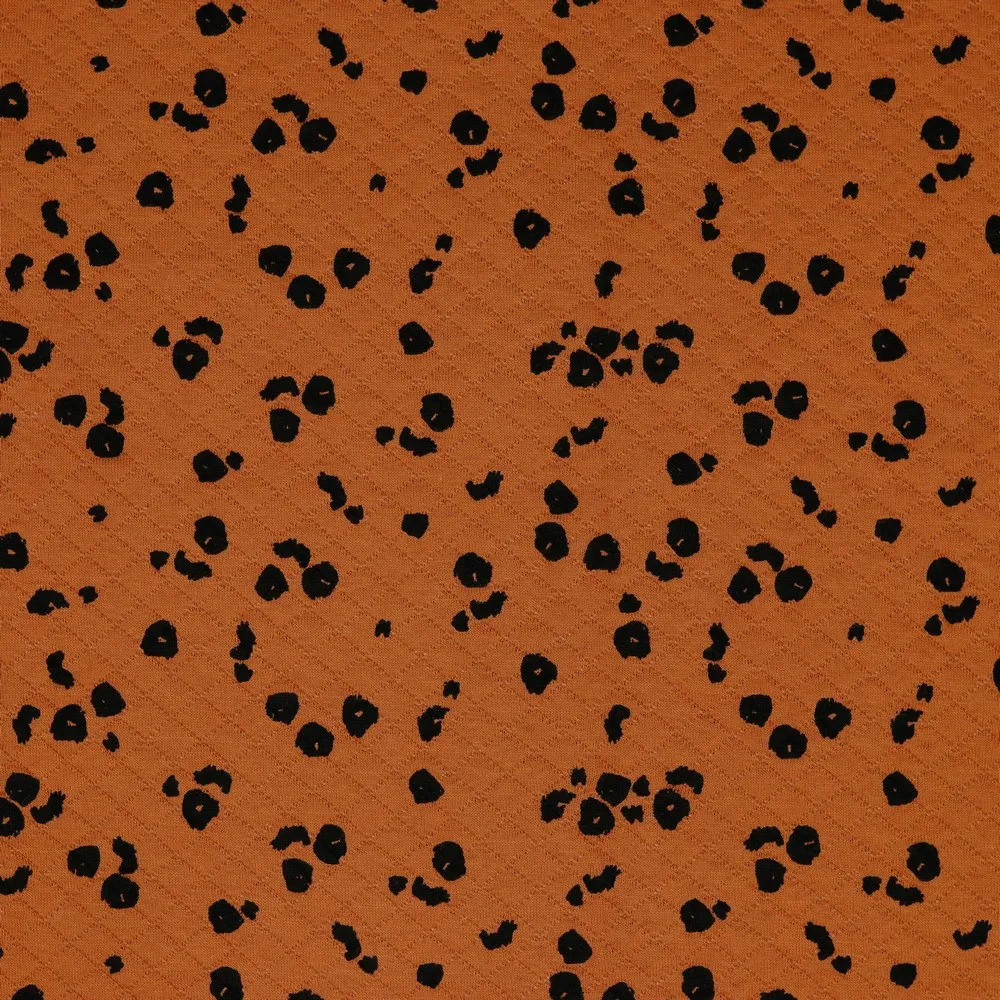 Oranje Quilt met Zwarte Vlekjes van Poppy