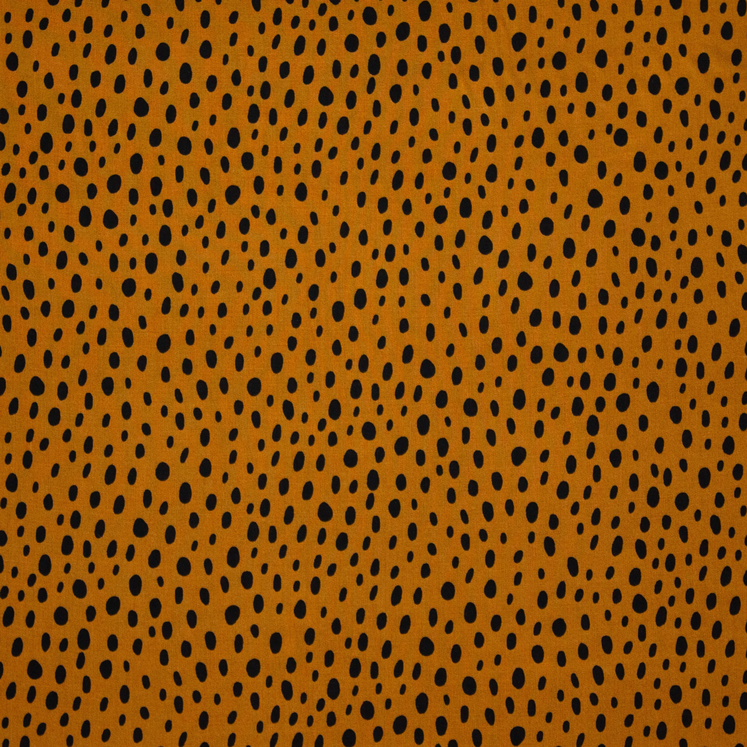 Bruine viscose met donkere stippen