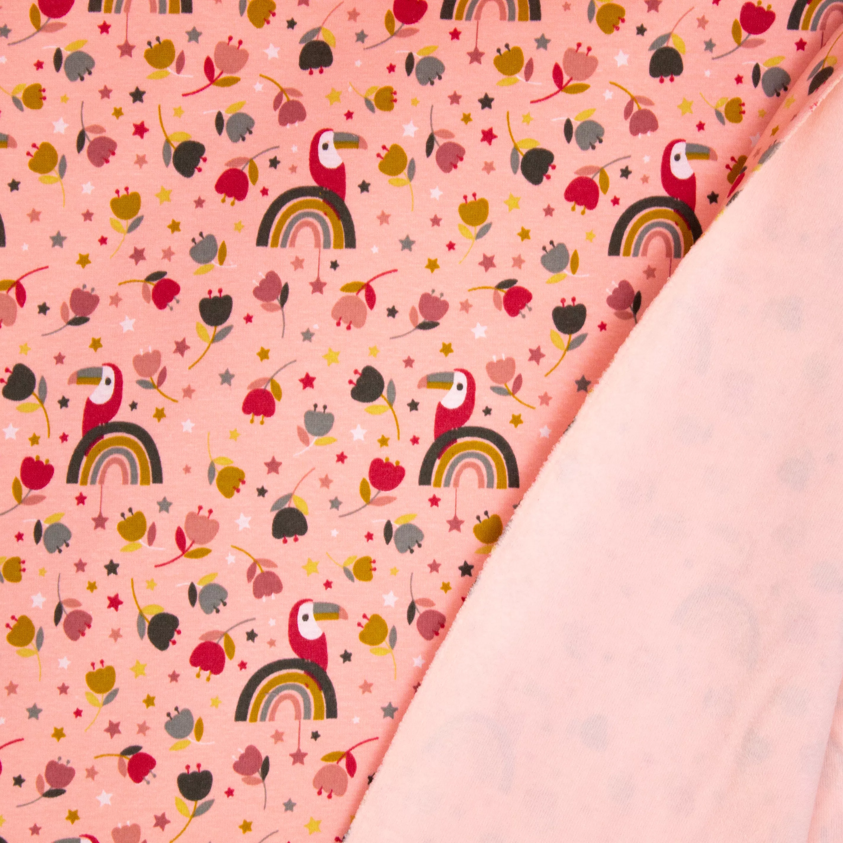 Roze sweaterstof met vogels en regenbogen