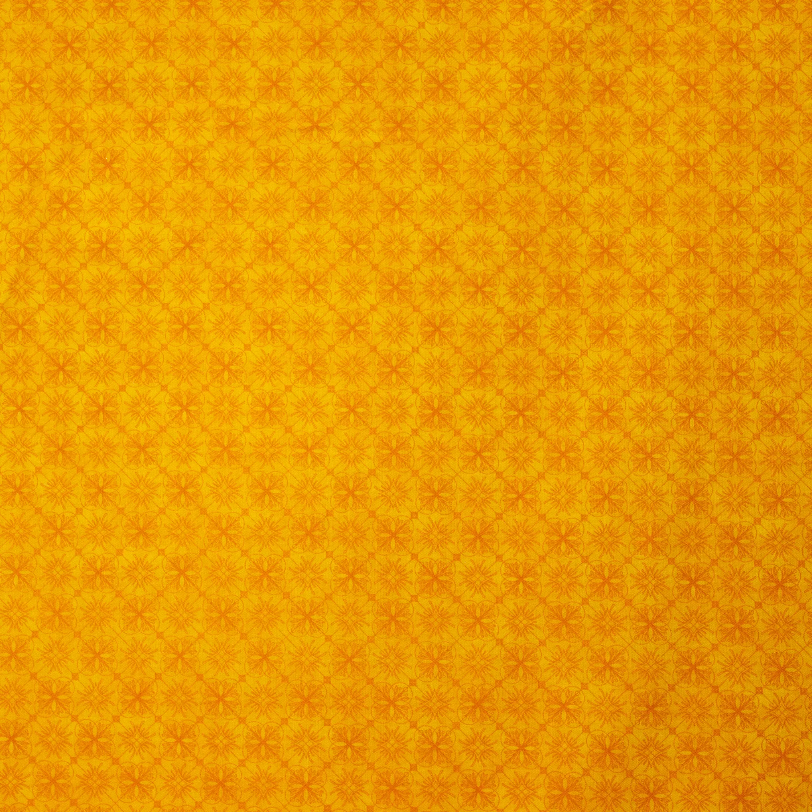 Gele Katoen met Oranje Motief