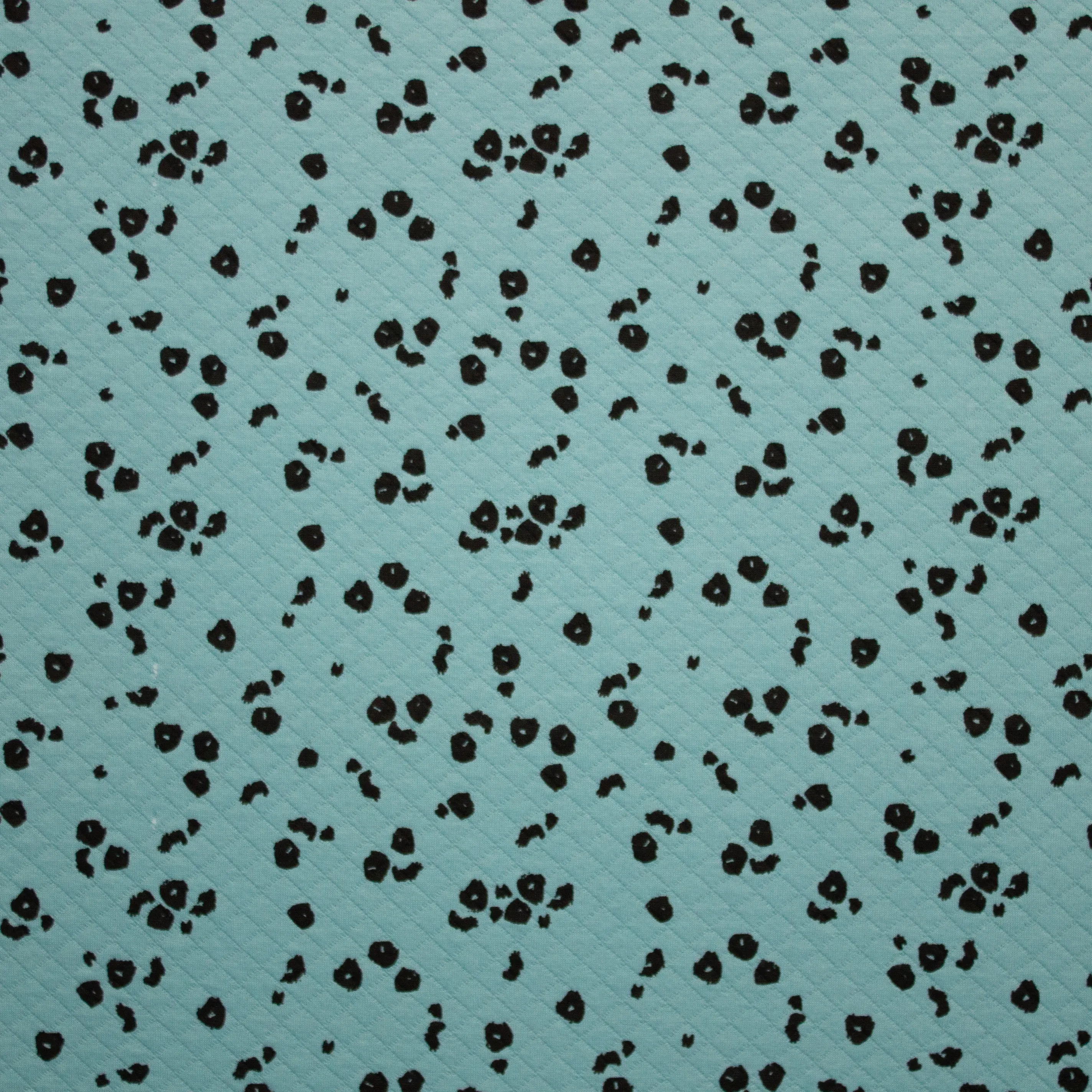Turquoise Quilt met Zwarte Vlekjes van Poppy