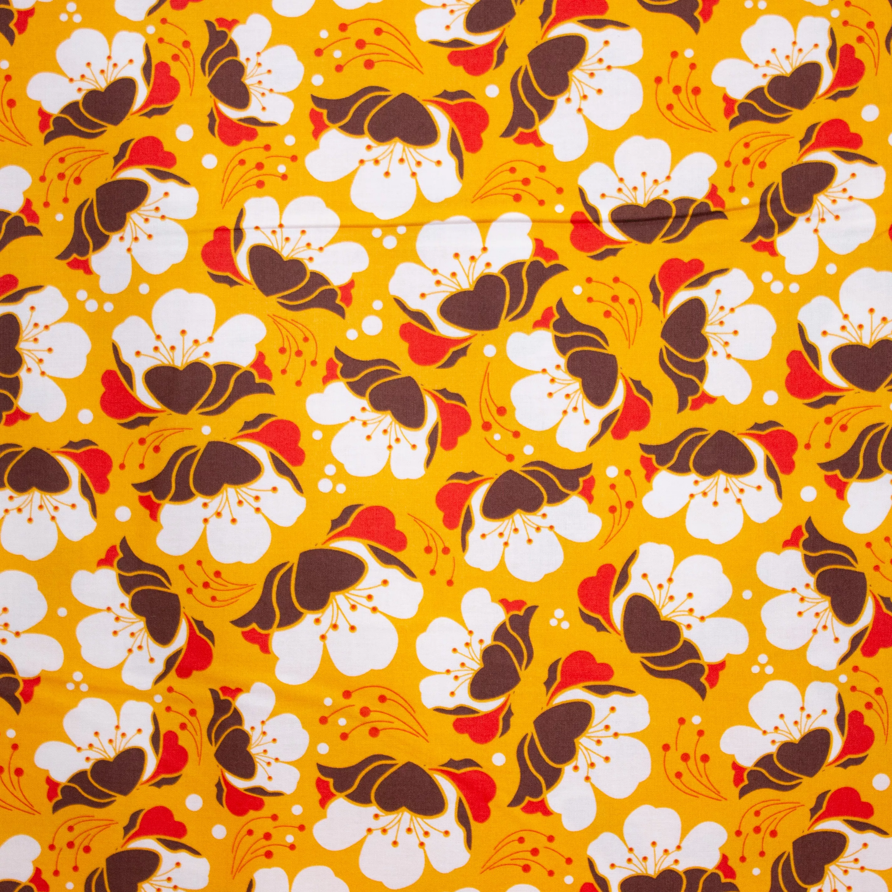 Oranje katoen met retro bloemen