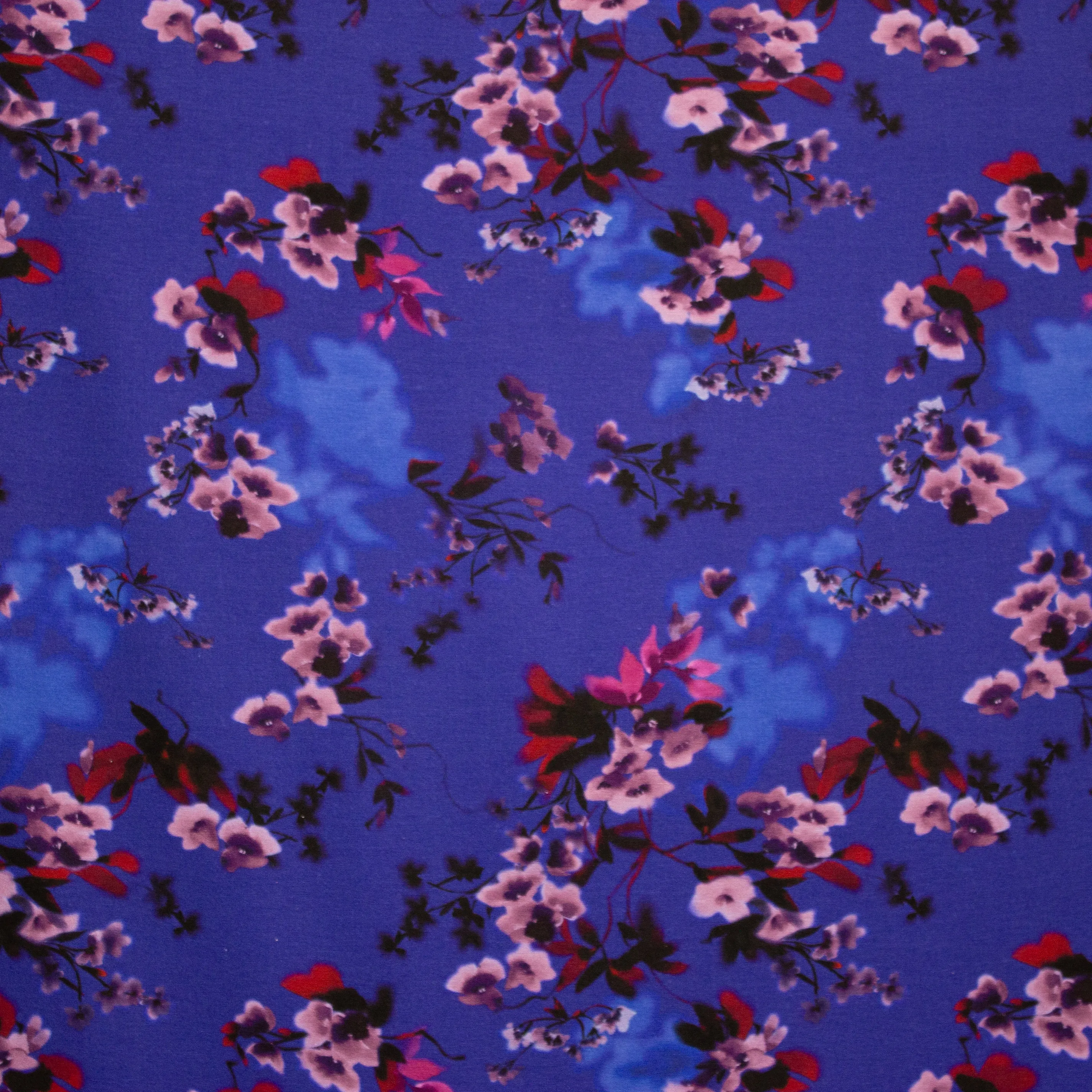 Blauwe viscose tricot met bloemetjes