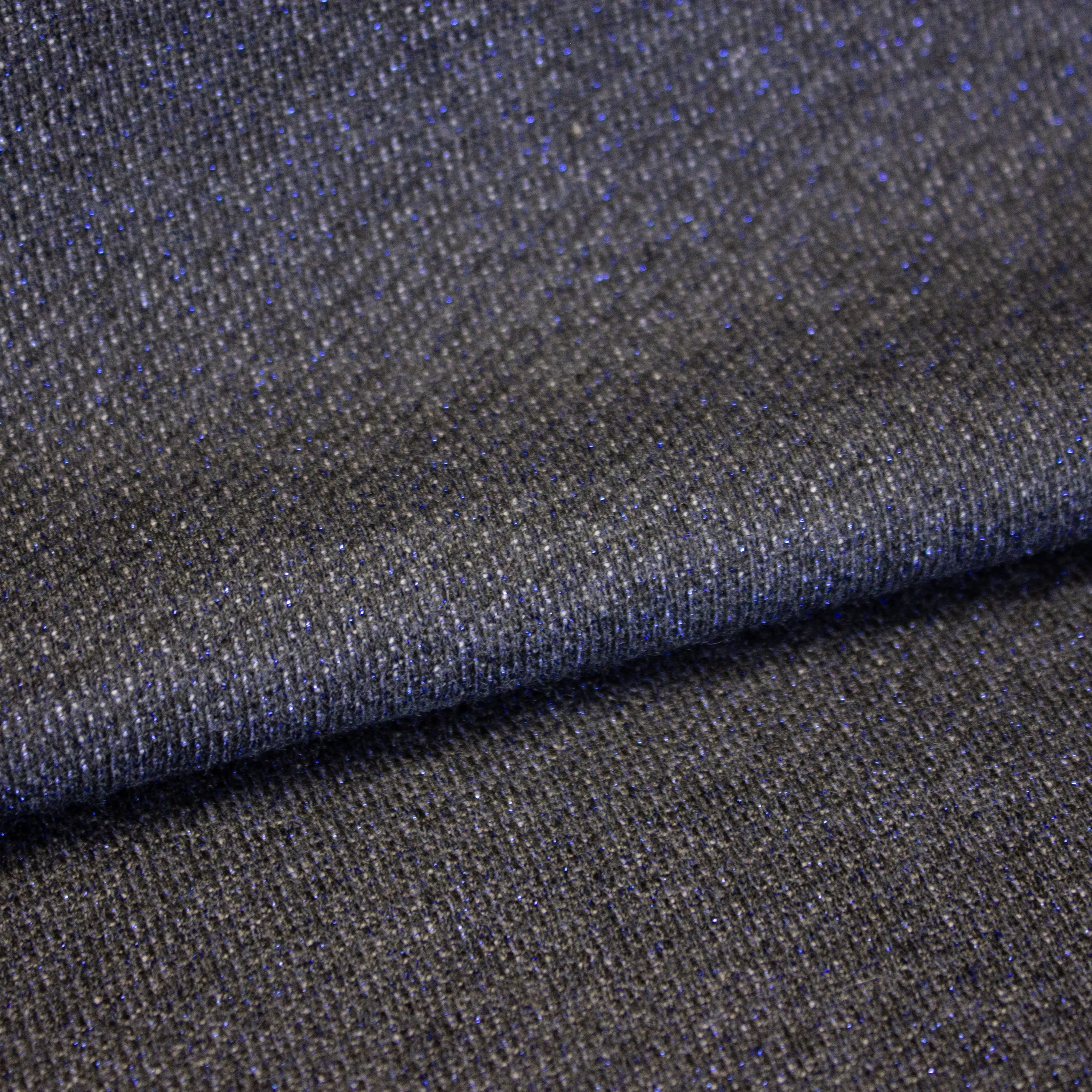 Blauwe sweaterstof in katoen / viscose mengeling met blauwe glitter