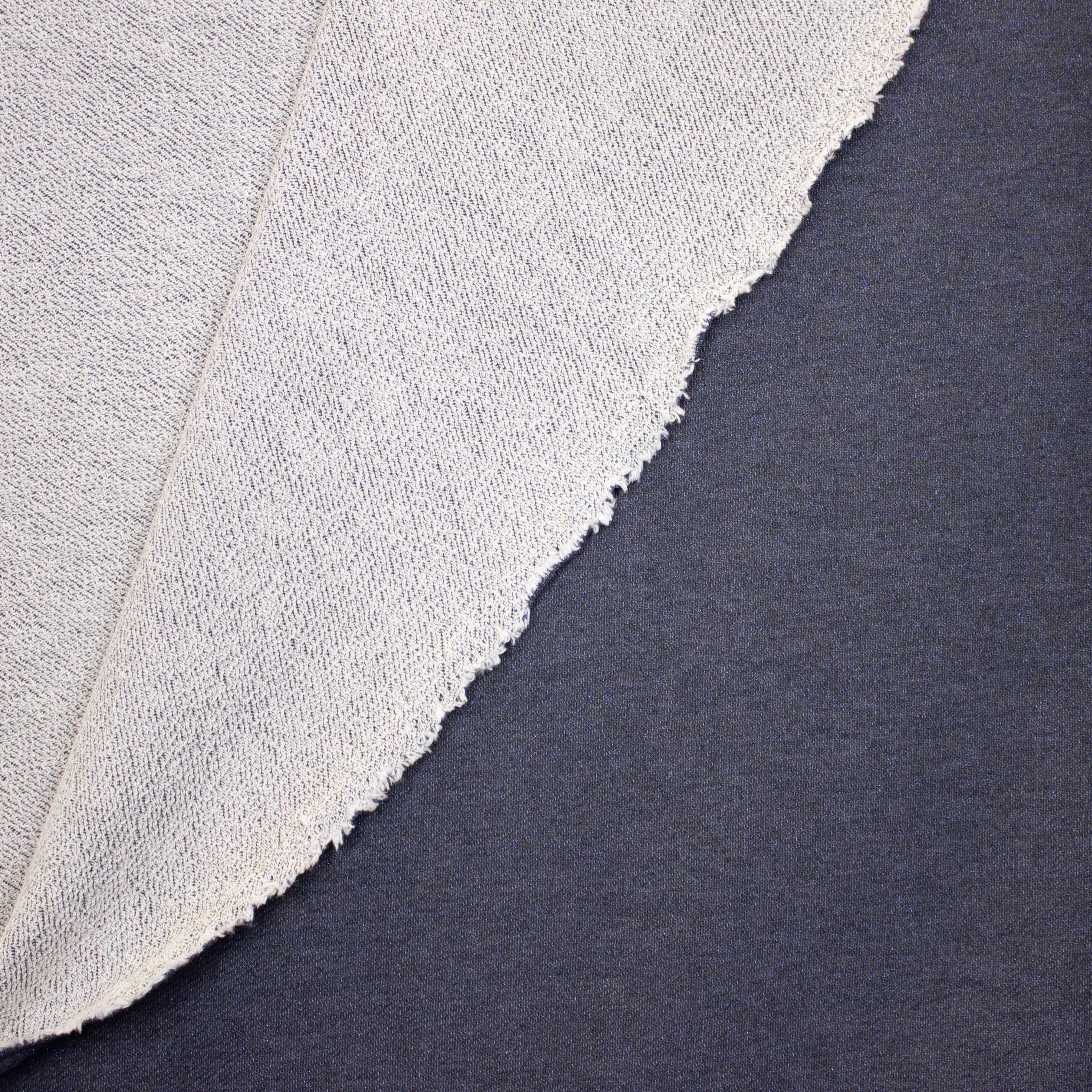 Blauwe sweaterstof in katoen / viscose mengeling met blauwe glitter
