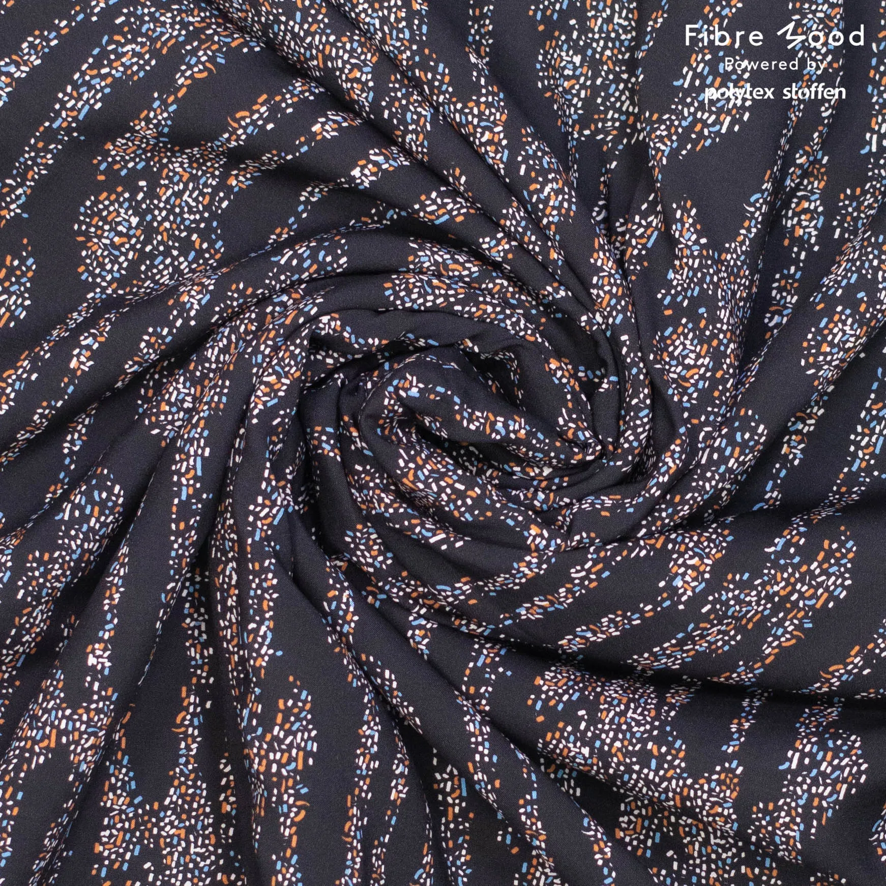Zwarte viscose met witte, blauwe en oranje spikkeltjes van Fibre Mood