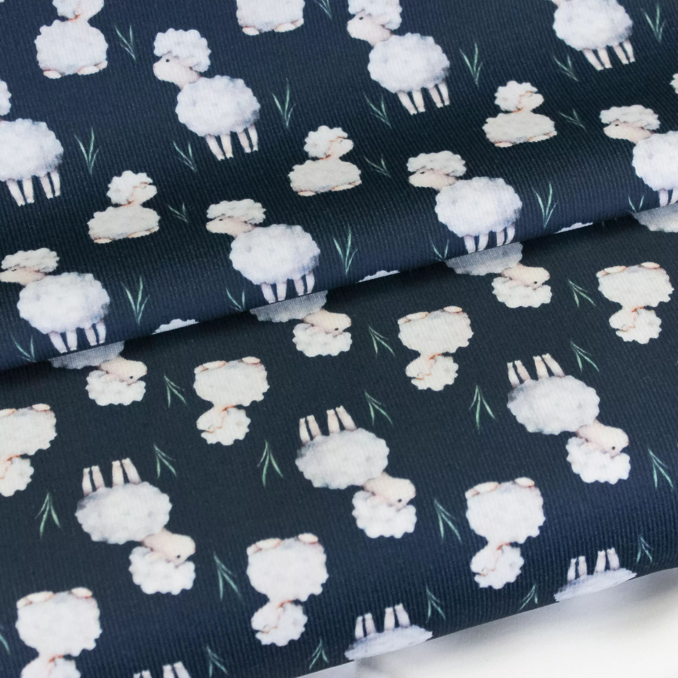 Donkerblauwe ribfluweel met schapen