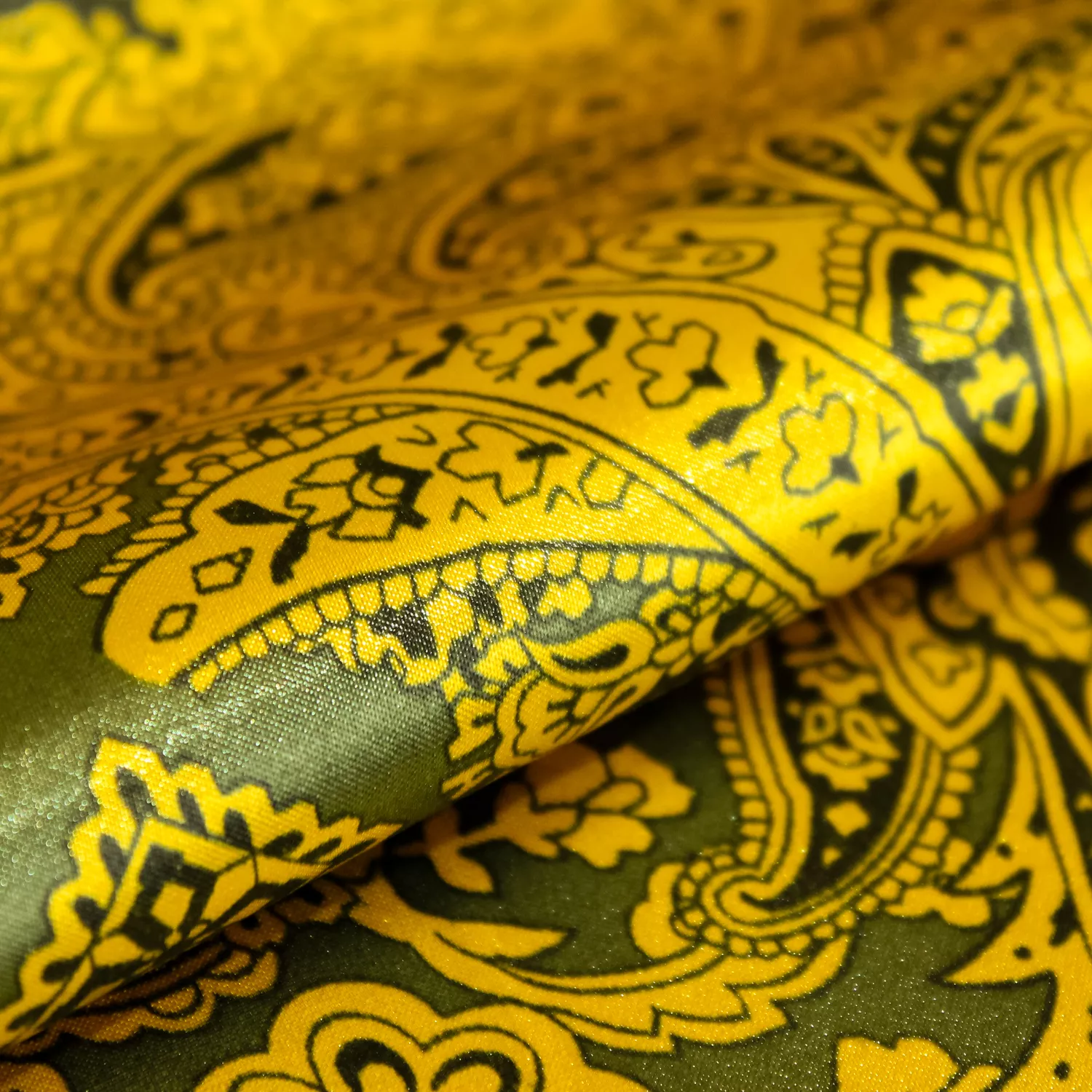 Polyester elasthane groen met geel motief