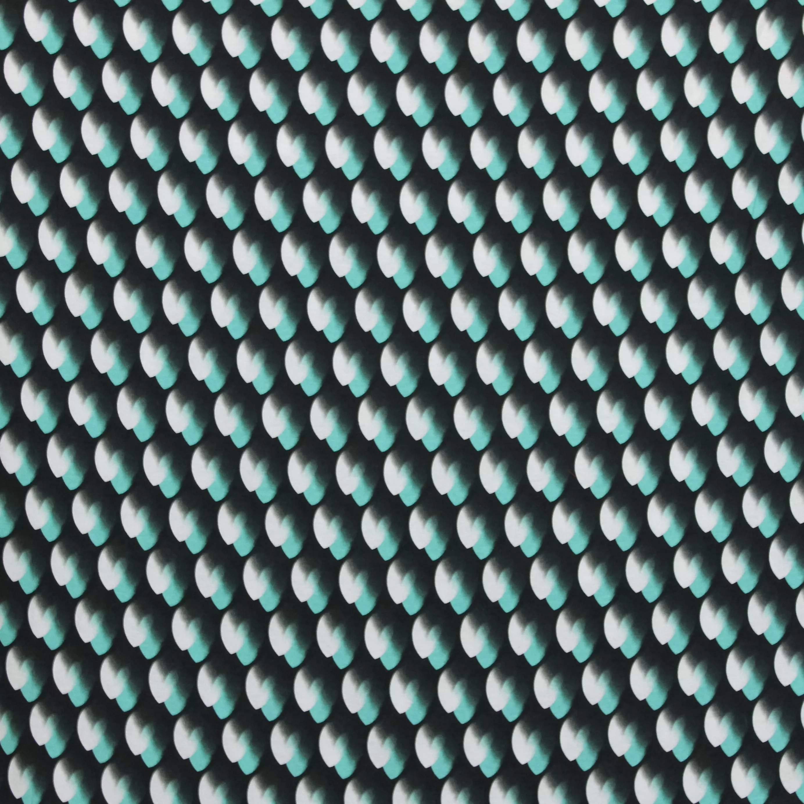 Zwarte Italiaanse viscose tricot met turquoise en wit motief