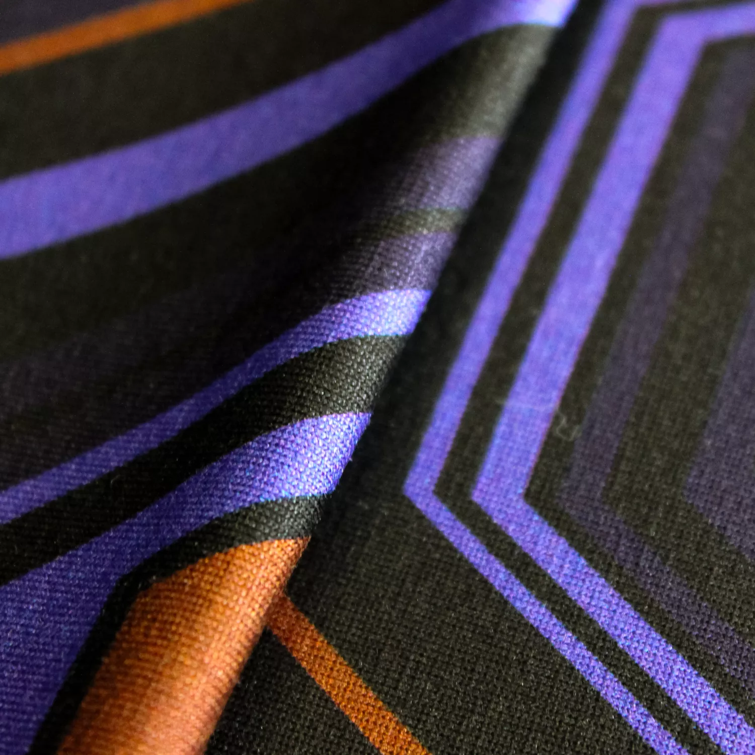 Viscose tricot blauw met bruin motief