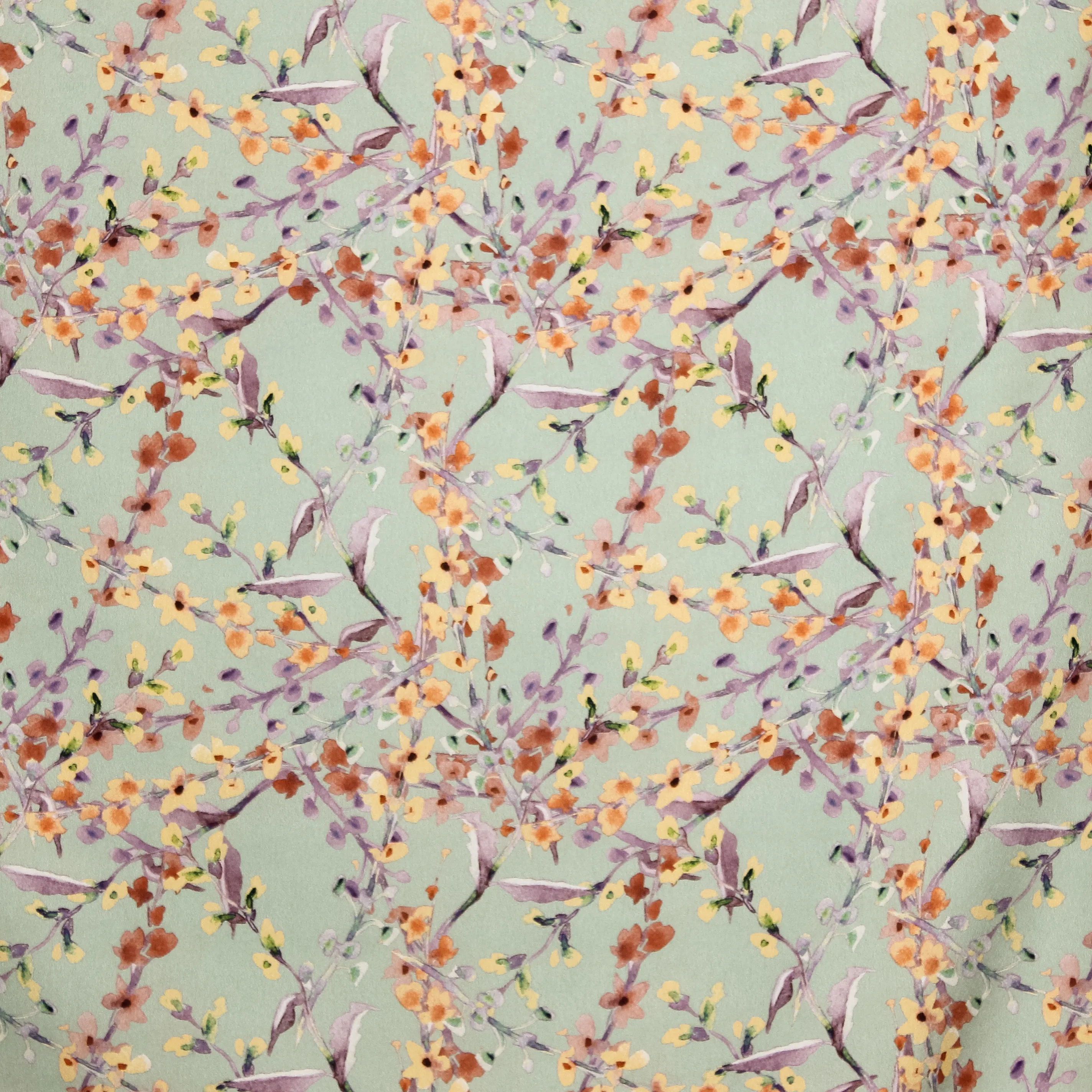 groene polyester met takjes en bloemetjes