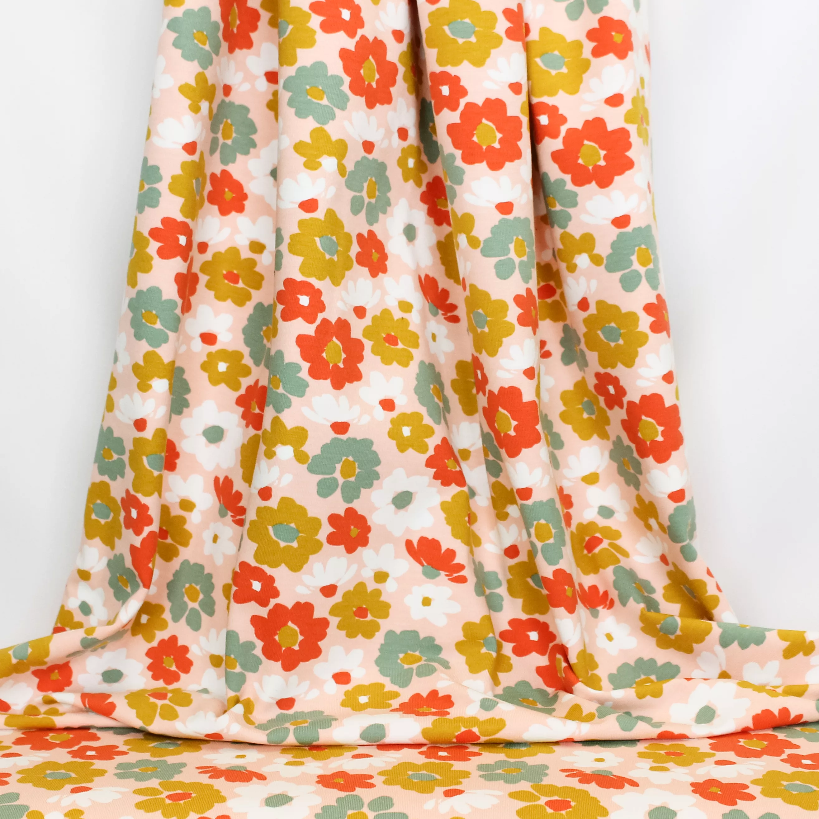 Roze katoentricot met bloemen van Poppy