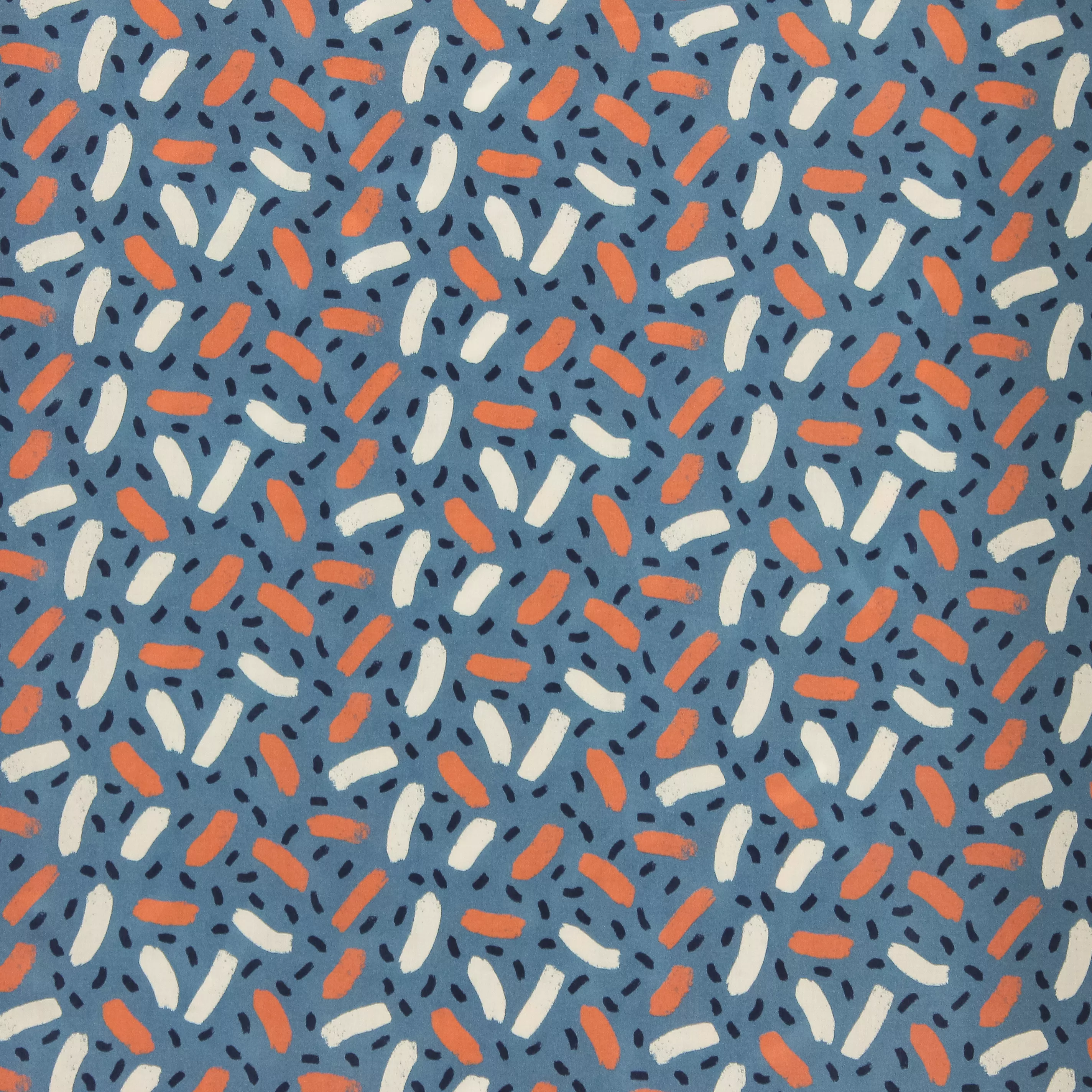 Blauwe viscose met oranje en witte motiefjes