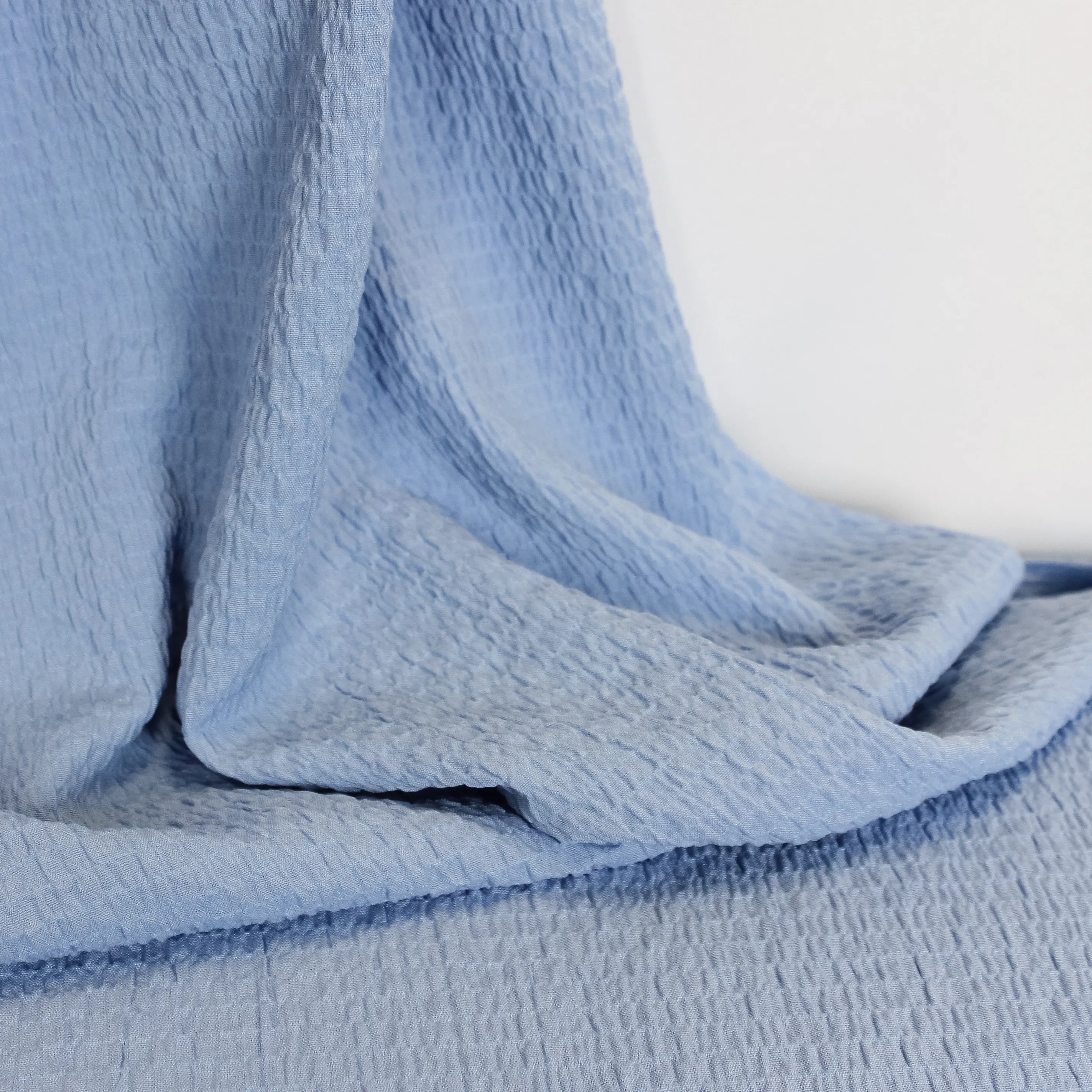 Blauwe viscose/polyester seersucker stretch