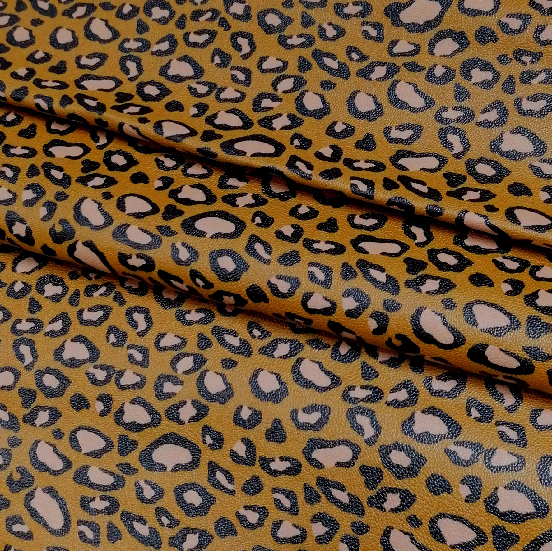 Imitatieleer bruin met luipaardvlekken en stoffen achterzijde - 40 cm x 140 cm