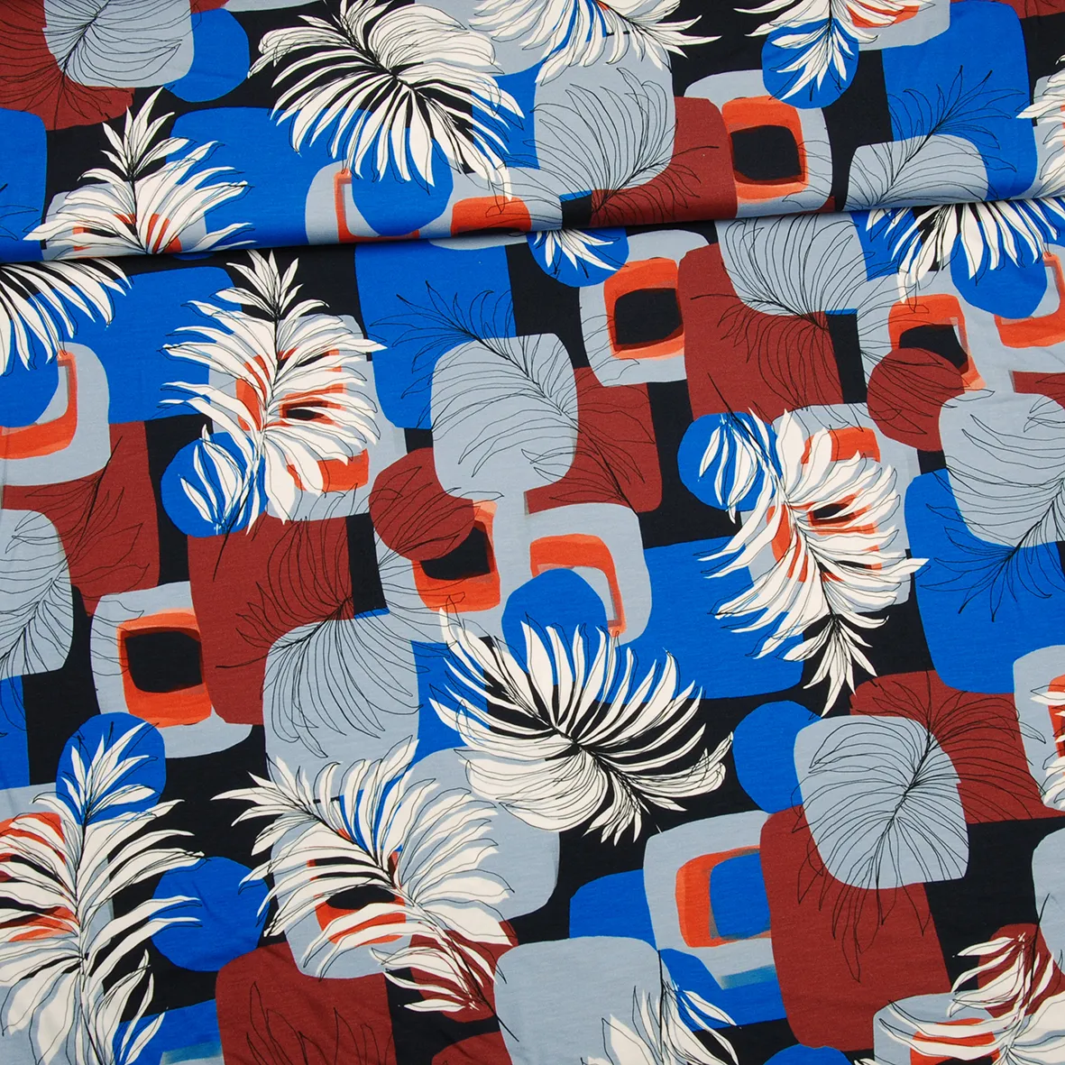 Viscose tricot met bladeren en abstracte print - Knipmode Collectie Lente-Zomer 2022