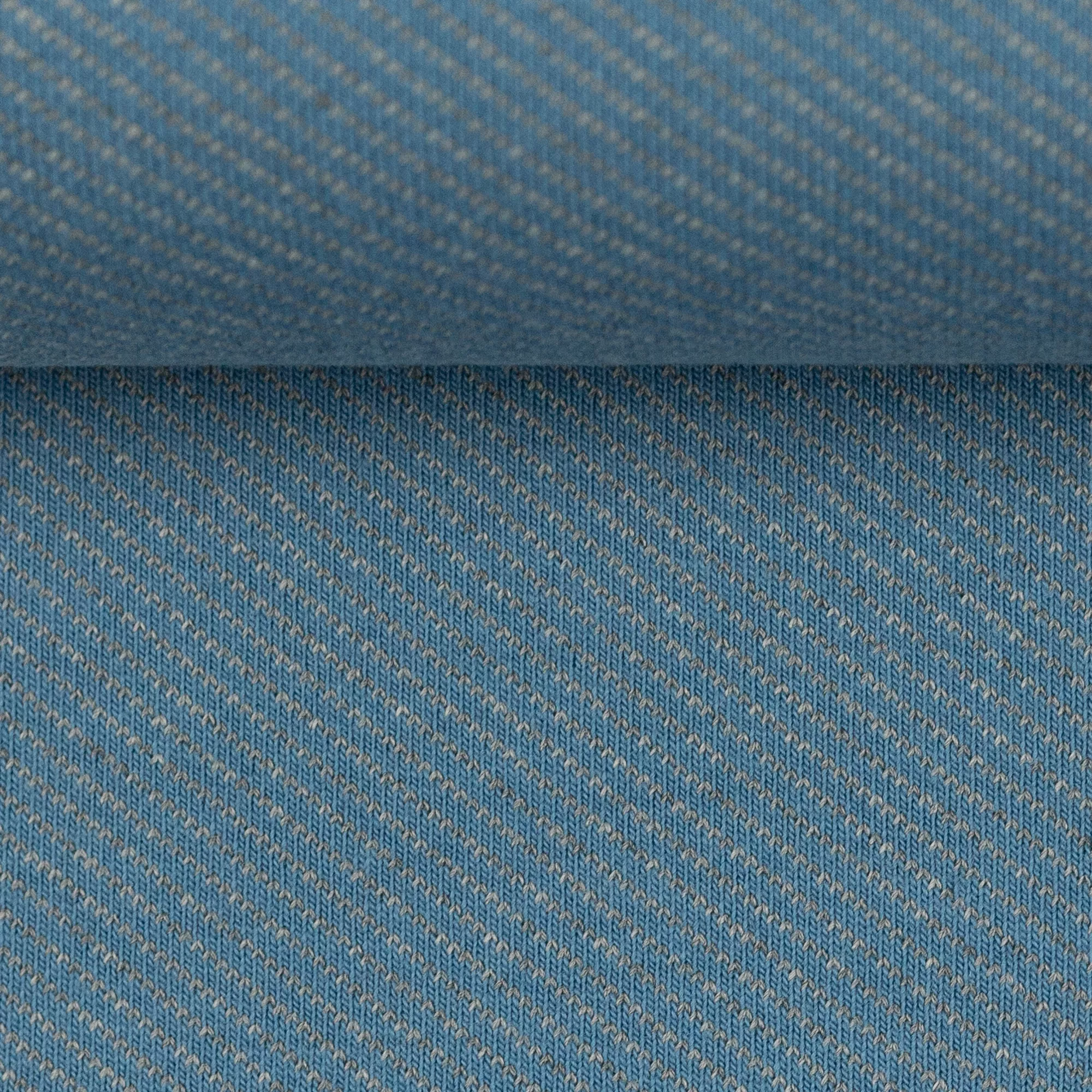 Licht rekbare blauwe jacquard in katoen / polyester