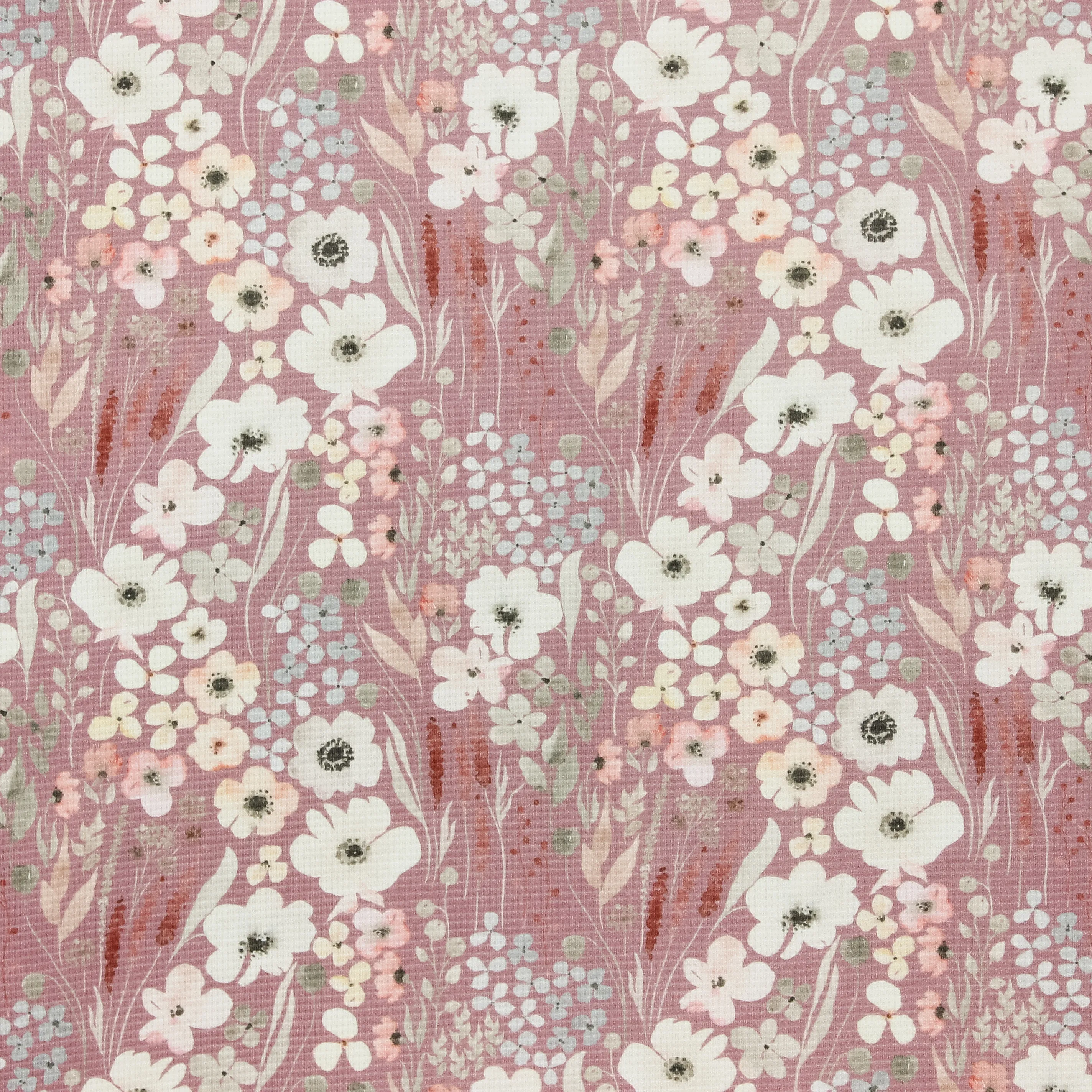 Oud roze wafelstof met bloemen