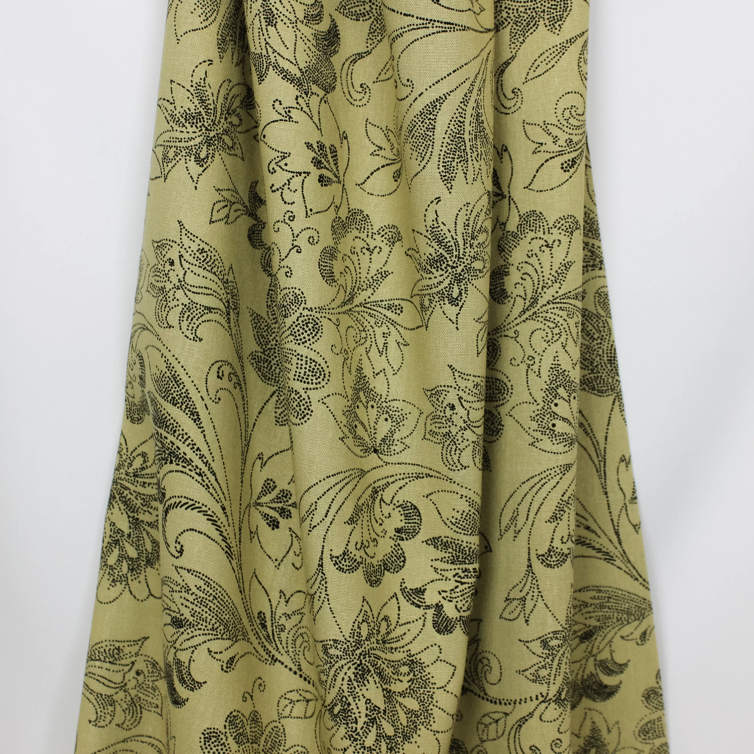 Groene linnen viscose met sierlijke gestipte bloemen