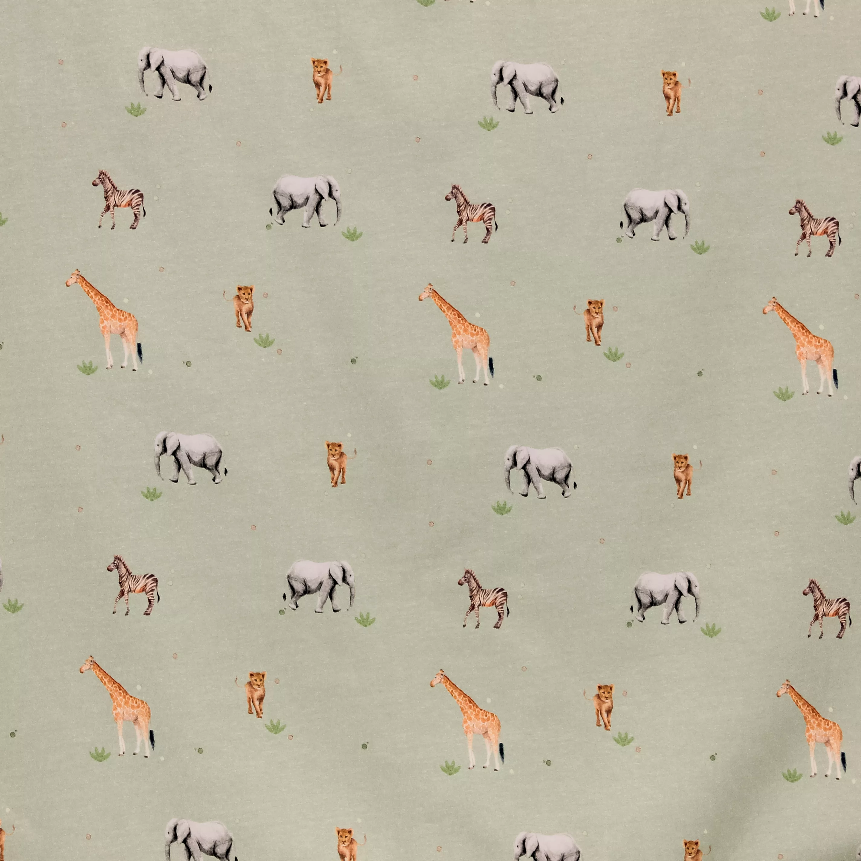 Tricot lichtgroen met exotische dieren