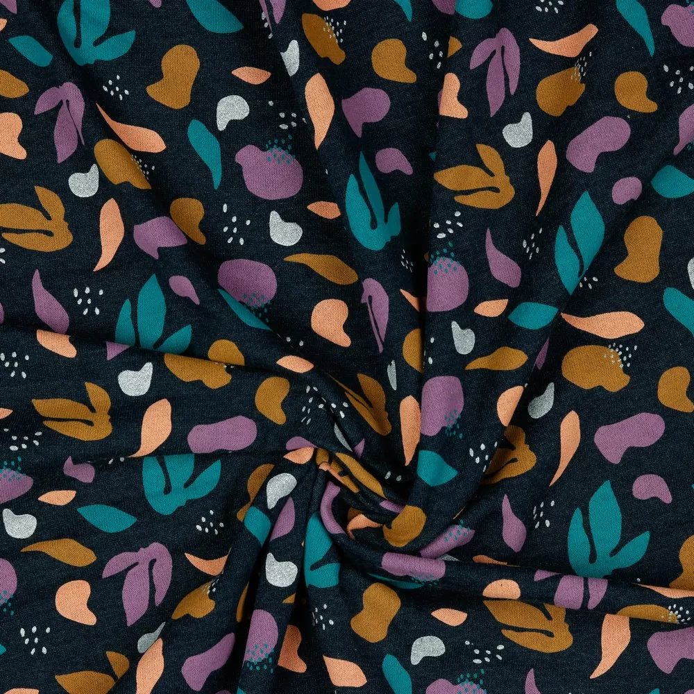 Sweaterstof zwart melange met blaadjes, glinsterend wit - Poppy