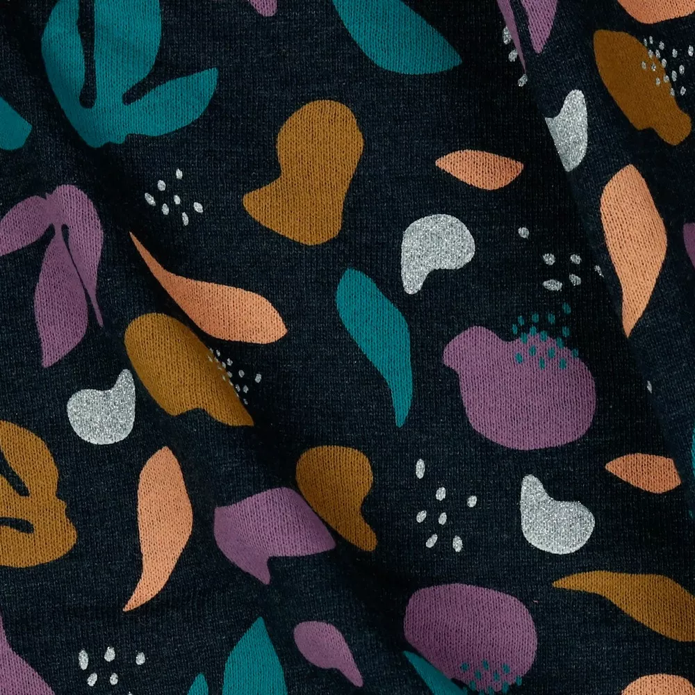 Sweaterstof zwart melange met blaadjes, glinsterend wit - Poppy
