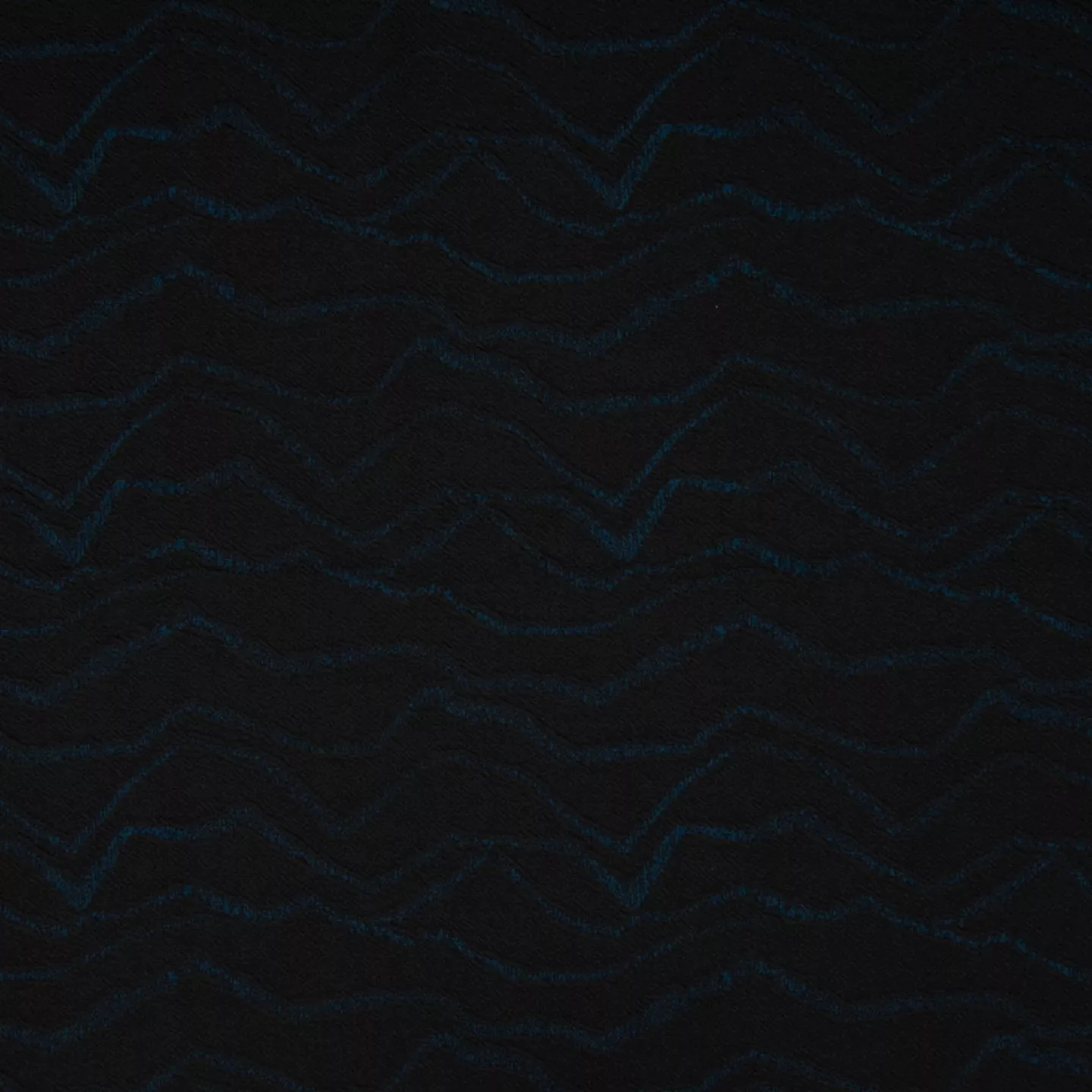 Zwarte stretch jacquard majorca met petrol golvende lijnen