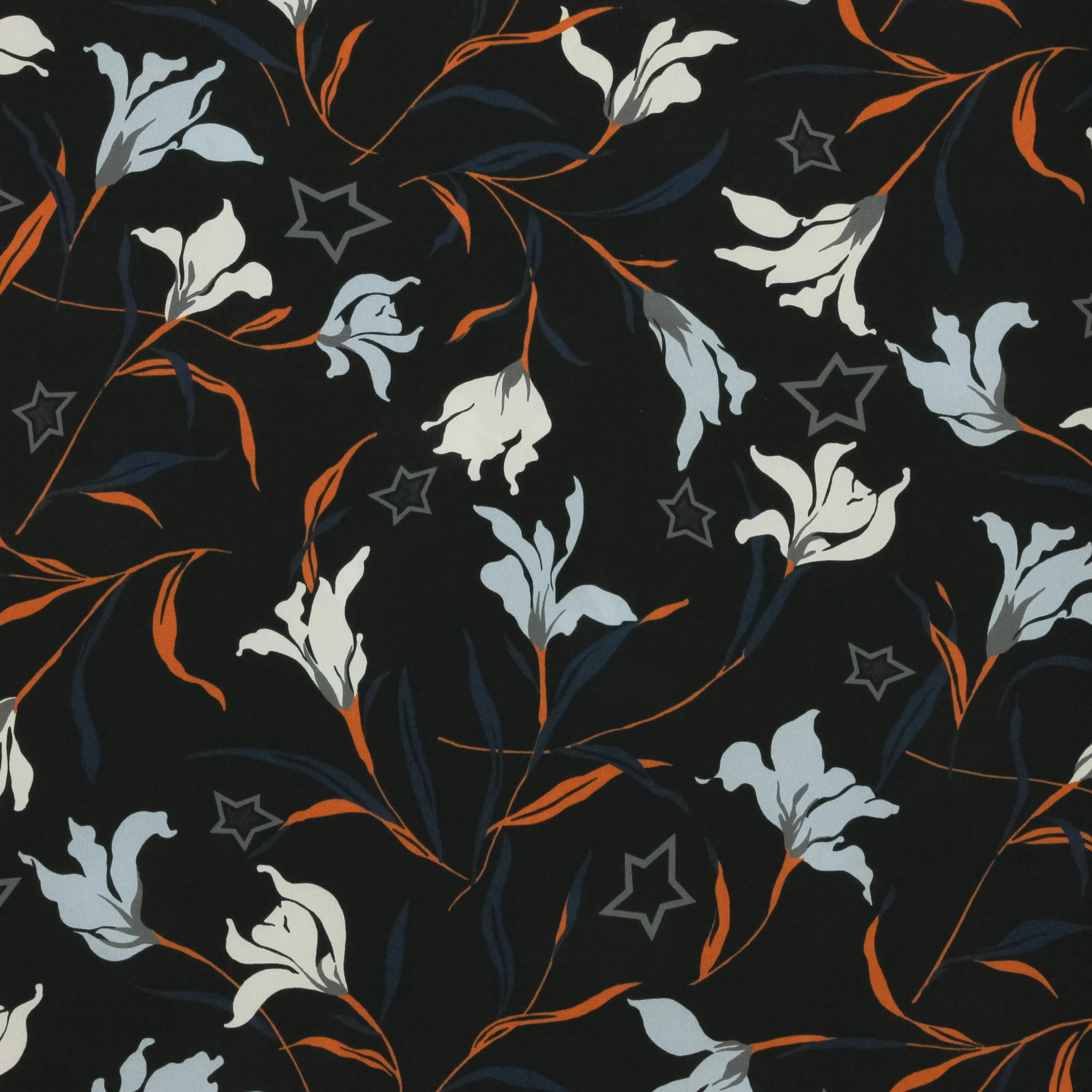 Lichte polyester crêpe zwart met bloemen en sterren