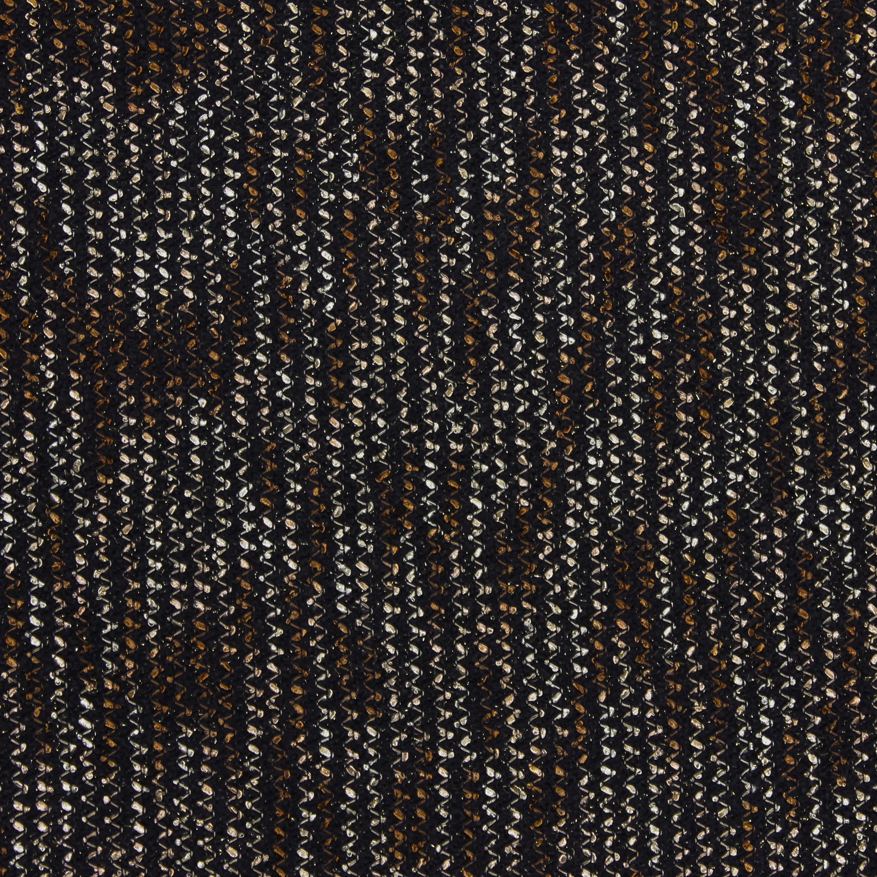 Gebreide bouclé donkerblauw met bruin/witte zigzag, subtiel glinsterend  - Knipmode