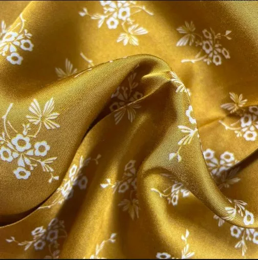 Viscose oker/goud met witte bloemetjes  - La Maison Victor