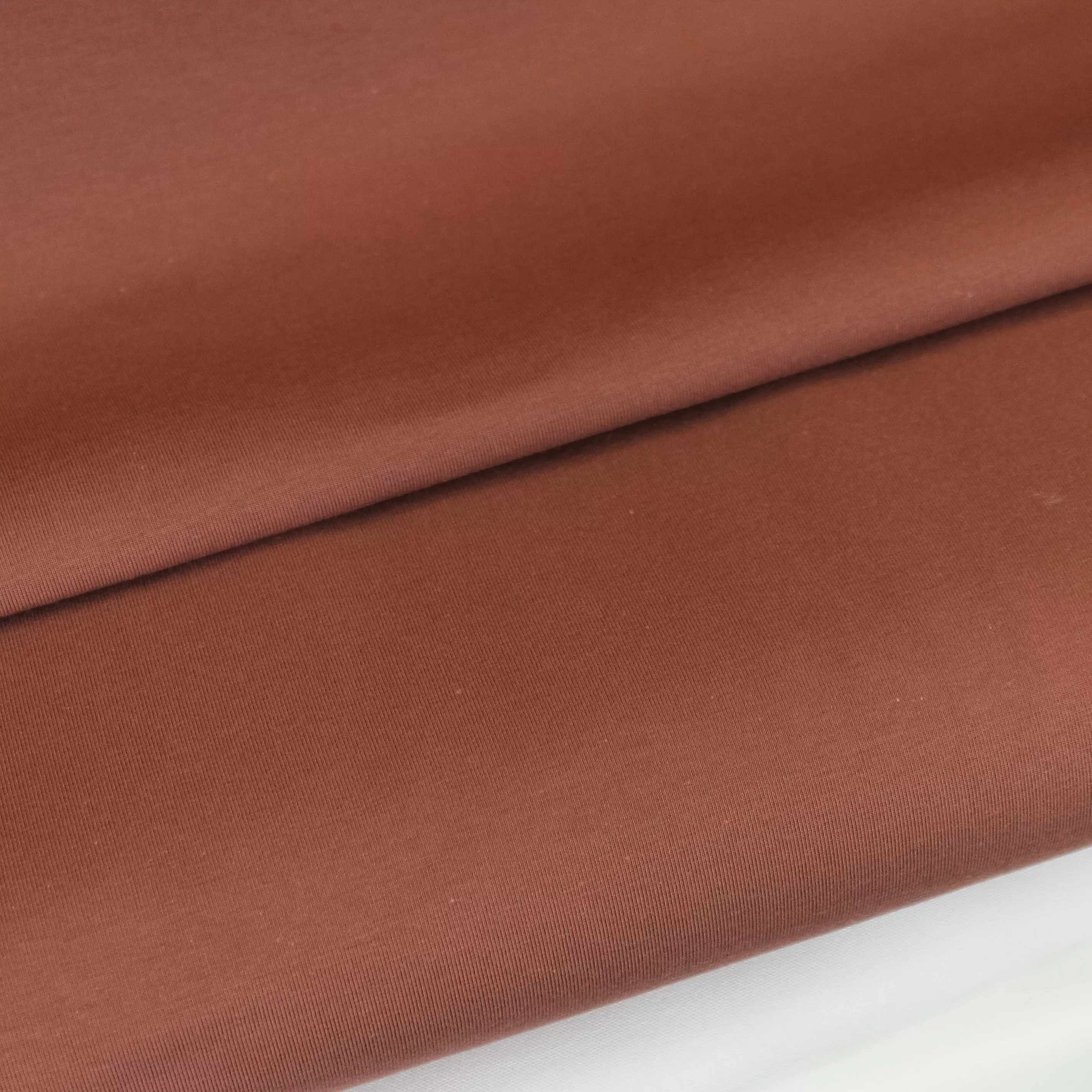 Roodbruine tricot met zeer licht gebrushte achterkant - La Maison Victor