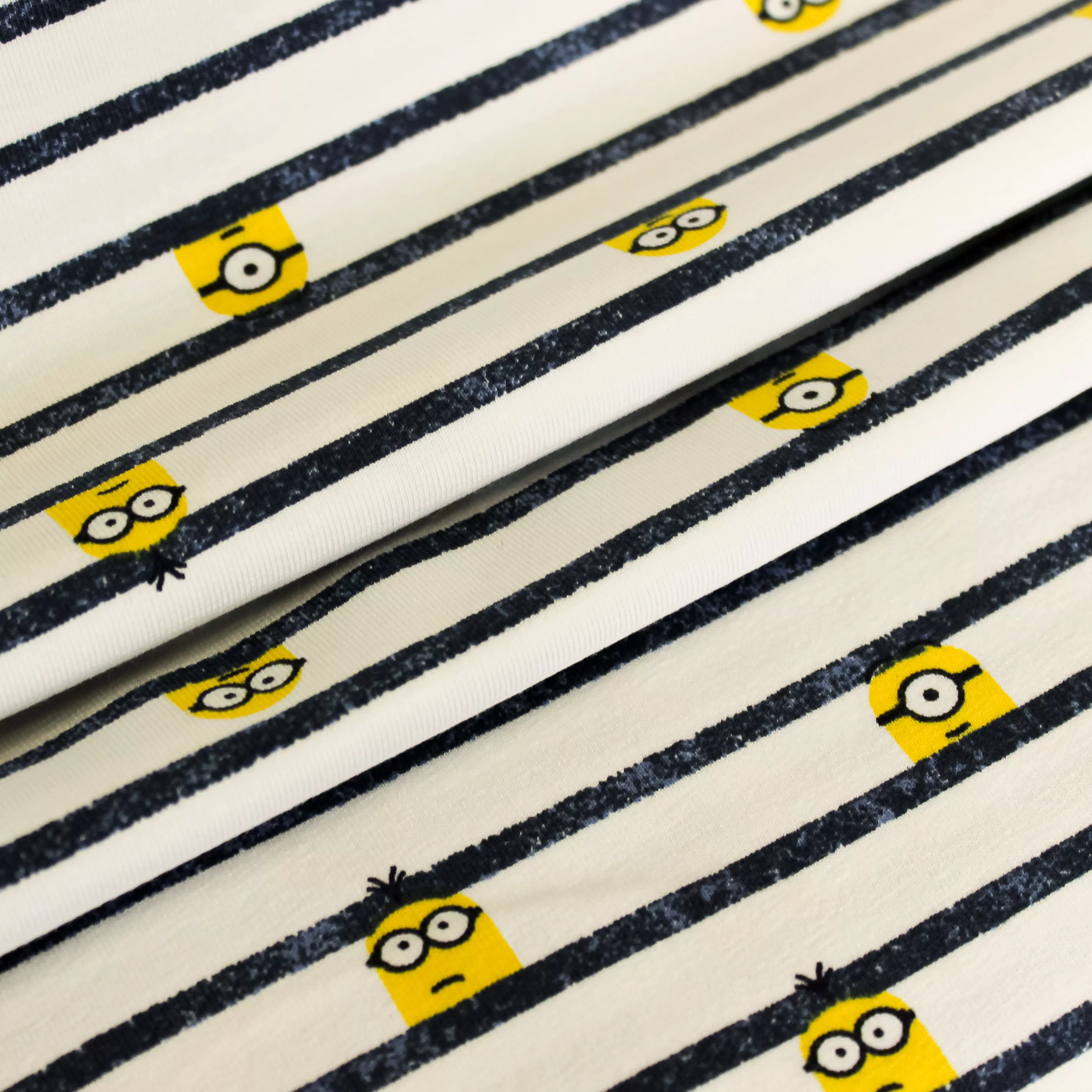 Katoen tricot wit met blauwe strepen en Minions